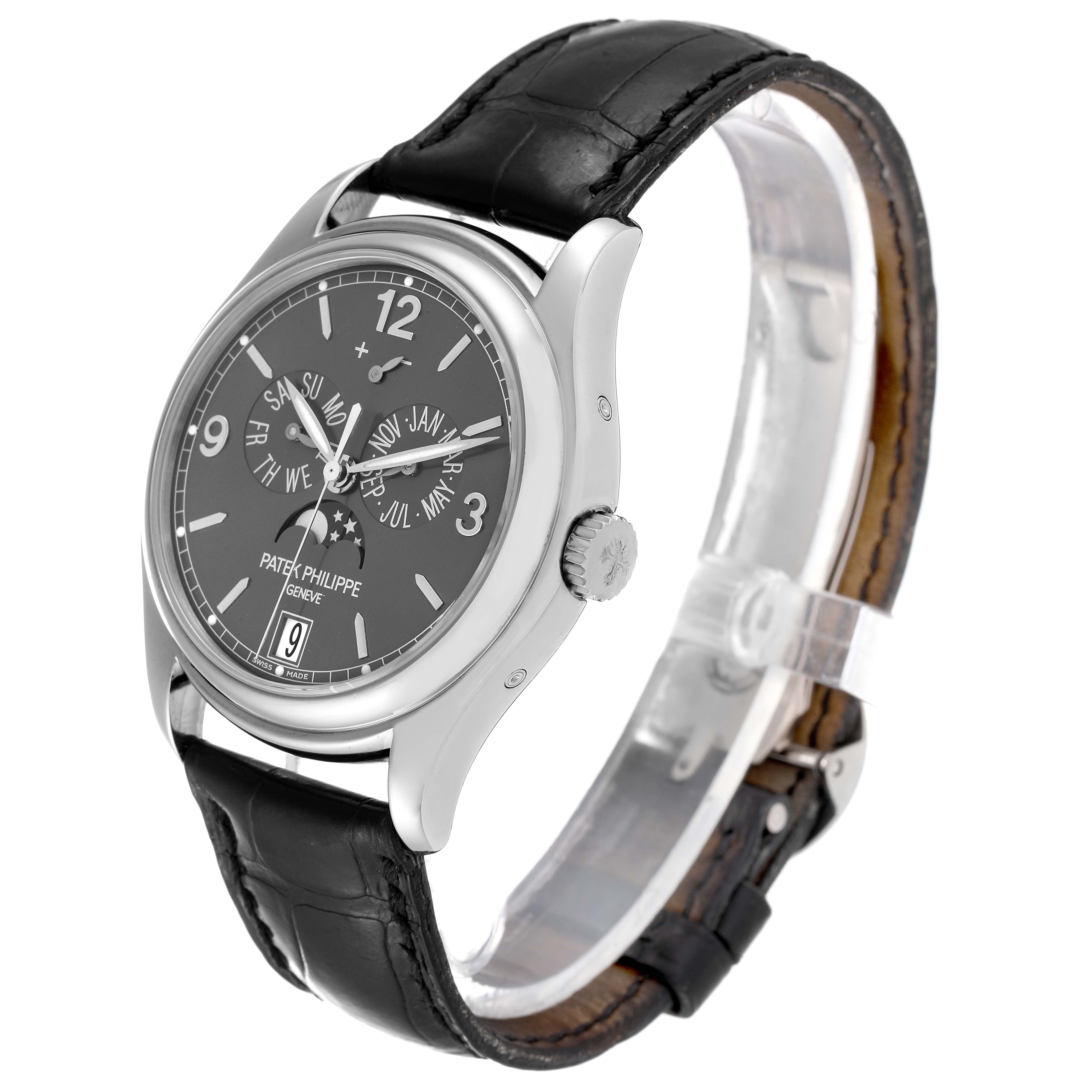 The image shows a side angle of the Patek Philippe Complications 5146G Men's White Gold Grey Dial 5146G Men's White Gold Grey Dial watch, highlighting the watch face, crown, and leather strap.