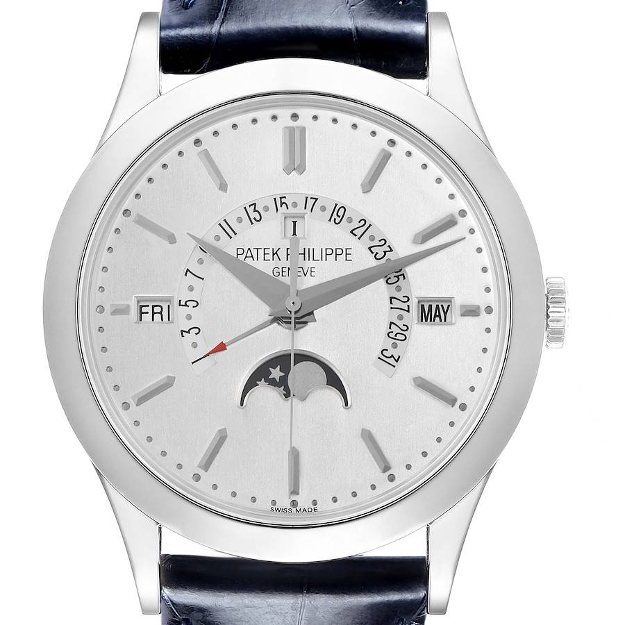 The Patek Philippe Complications 5496P-004 Men's Platinum Silver Dial watch is shown from a frontal angle, displaying the dial, hands, and calendar features.