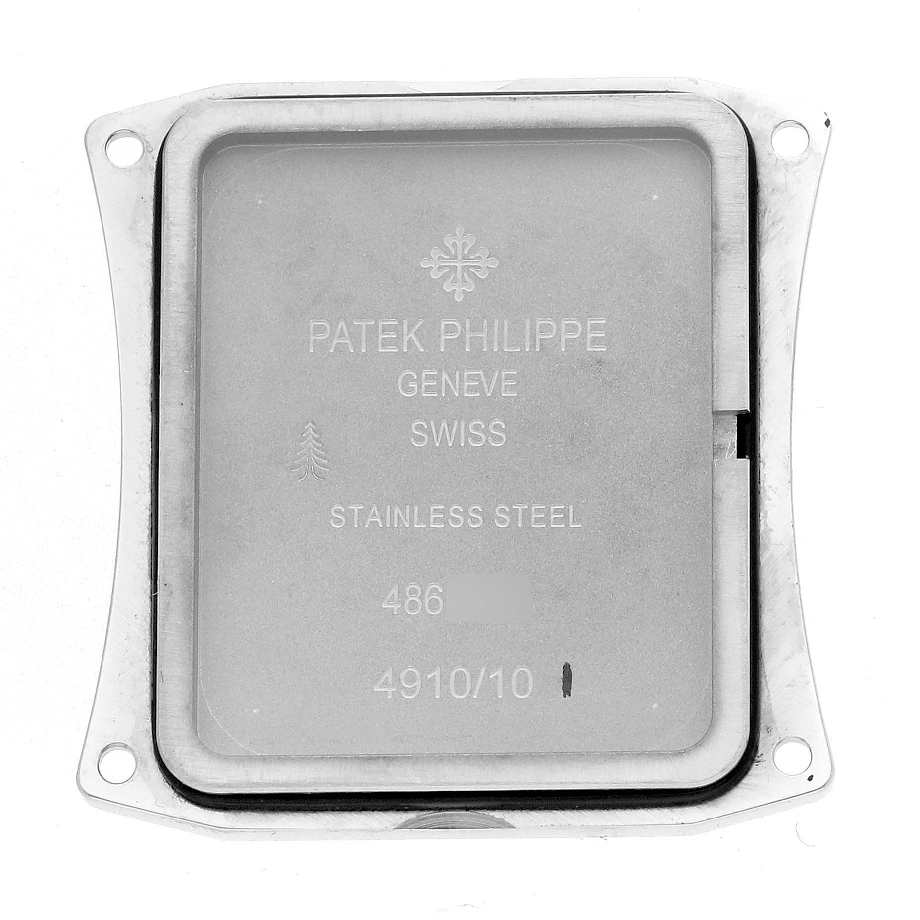 The image shows the case back of a Patek Philippe Twenty-4 4910 Women
s Stainless Steel Black Dial watch, highlighting the engravings and stainless steel material.