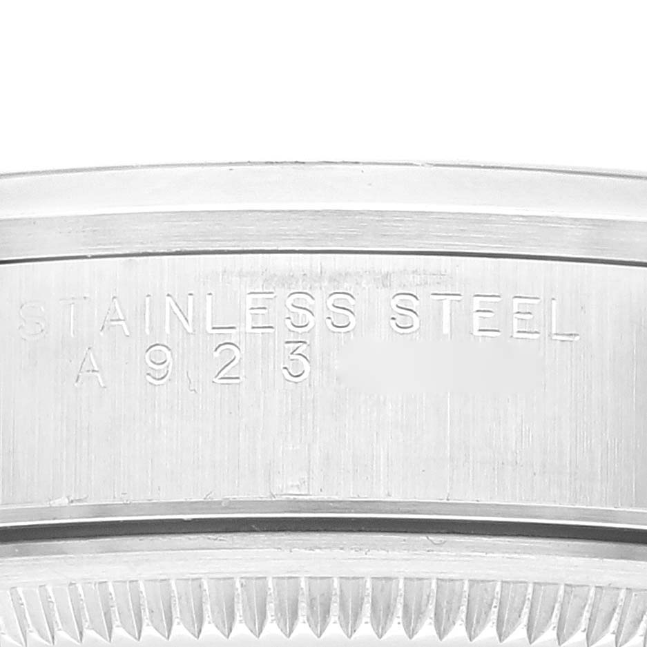 Close-up view of the engraved case back of a Rolex Air-King 14000 Men's Stainless Steel Blue Dial 14000 Men's Stainless Steel Blue Dial watch, focusing on the stainless steel marking.