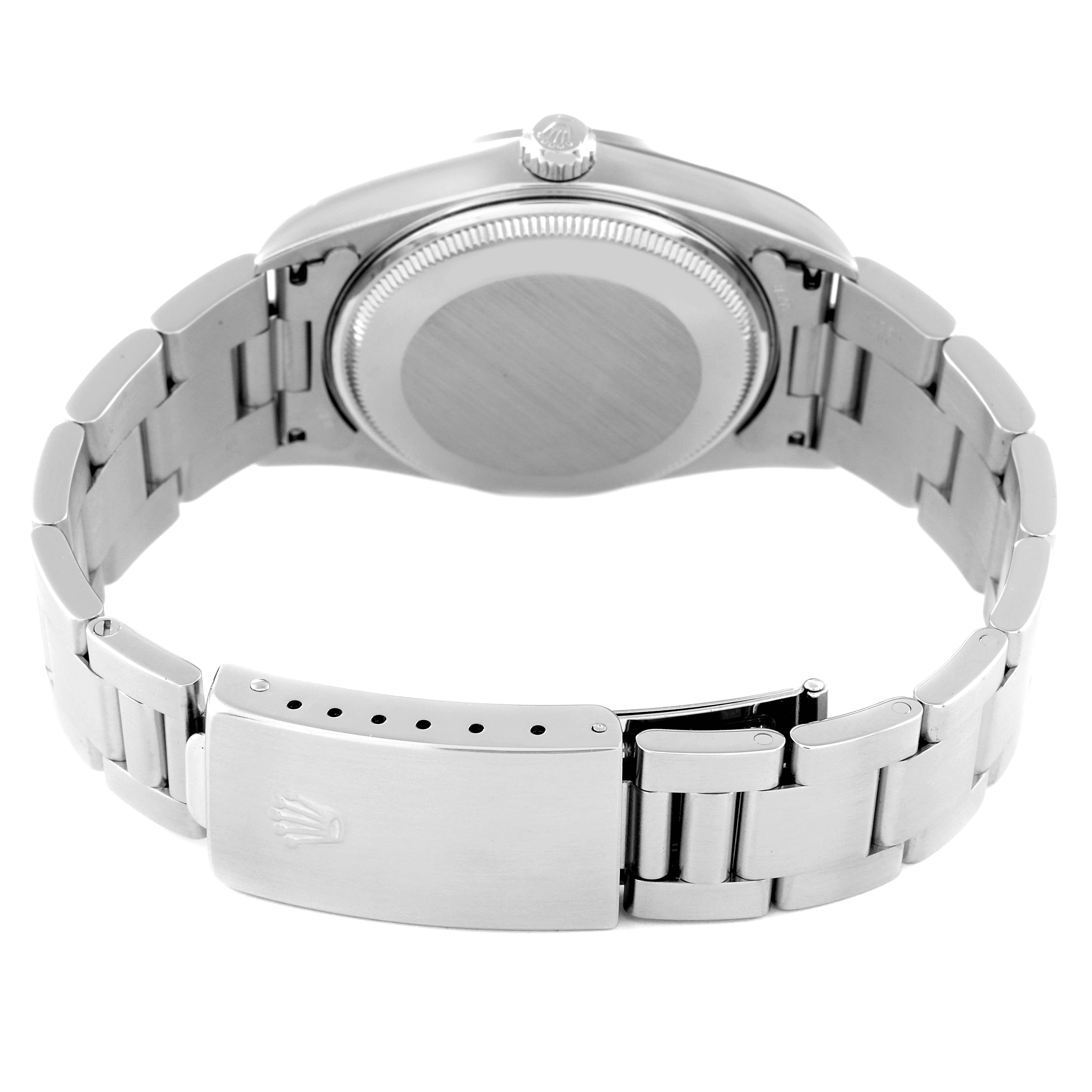 This image shows the back side and the clasp of a Rolex Air-King 14000M Men's Stainless Steel Black Dial 14000M Men's Stainless Steel Black Dial watch.