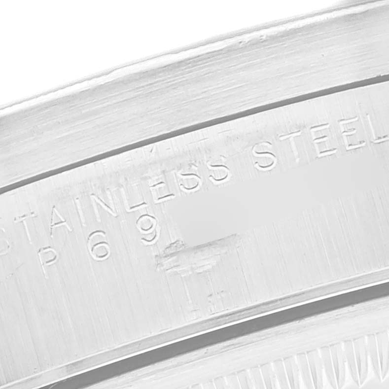 The image shows a close-up of the stainless steel marking inside the case of a Rolex Air-King 14010 Men's Stainless Steel Black Dial 14010 Men's Stainless Steel Black Dial watch.