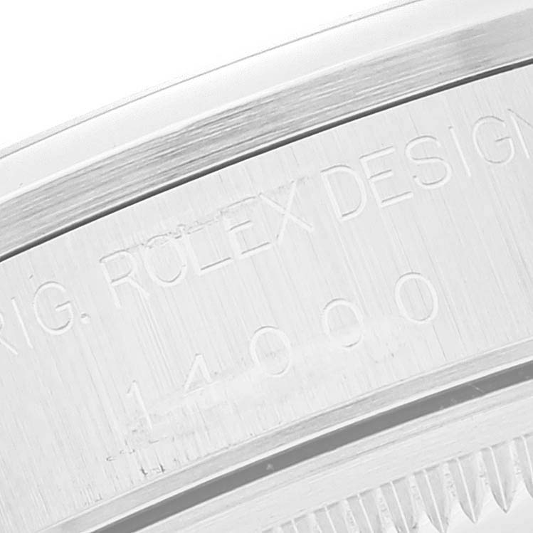 This close-up image shows the engraved side of the case back of a Rolex Air-King 14000 Men's Stainless Steel Silver Dial 14000 Men's Stainless Steel Silver Dial watch.