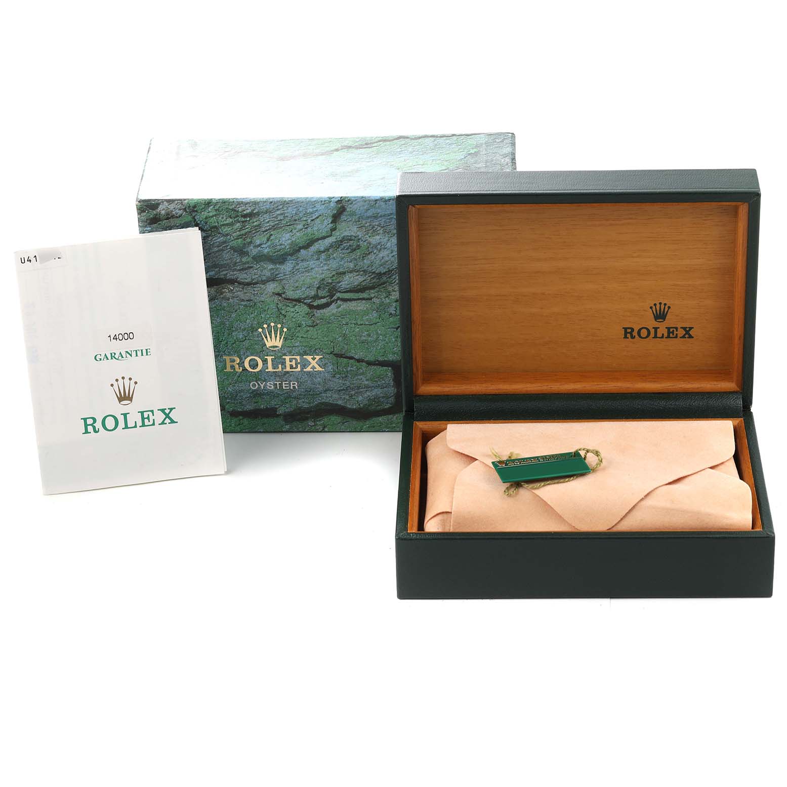 The image shows an open Rolex Air-King 14000 Men's Stainless Steel Silver Dial 14000 Men's Stainless Steel Silver Dial watch box, a warranty booklet, and packaging materials from a slightly elevated angle.