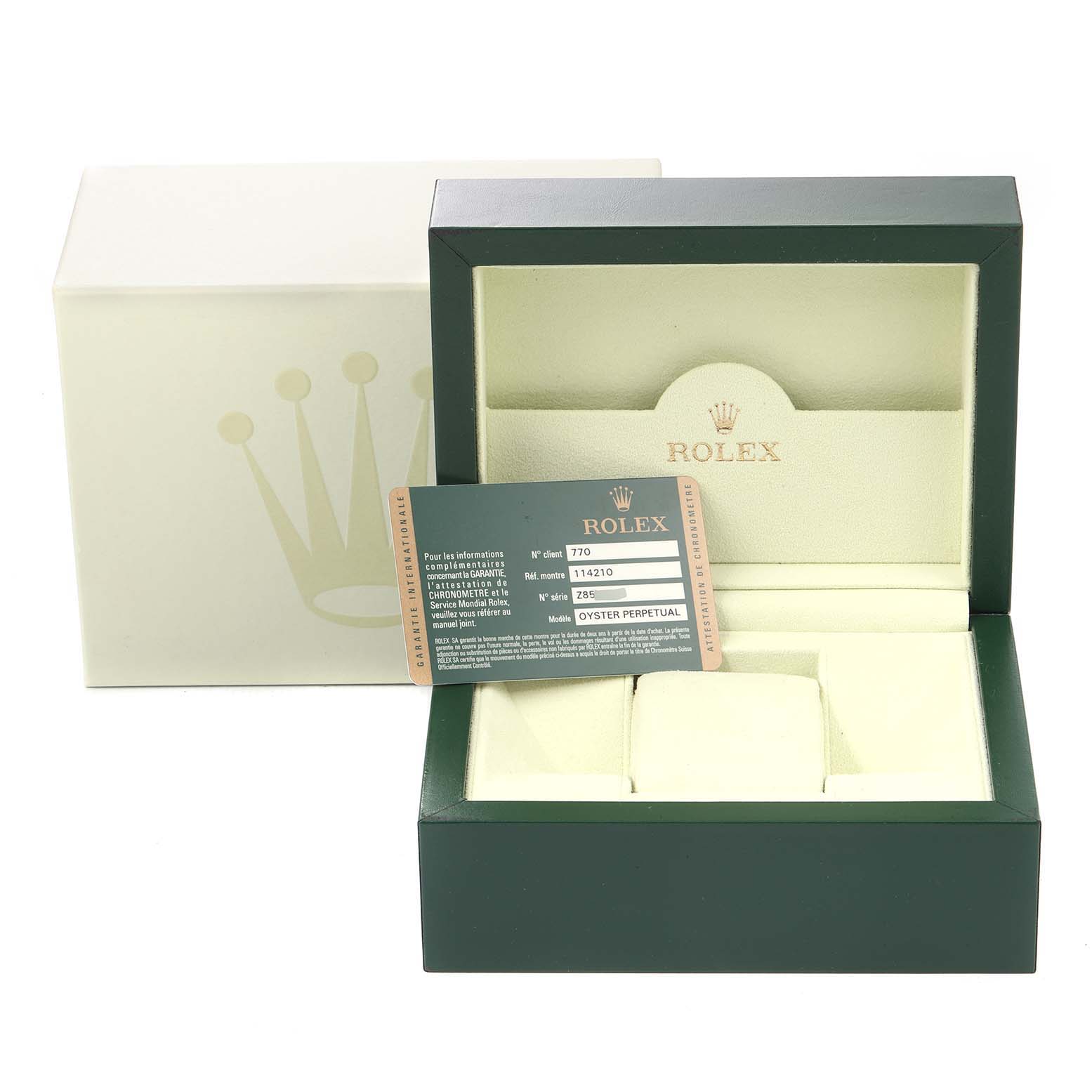 The image shows a Rolex Air-King 114210 Men's Stainless Steel White Dial 114210 Men's Stainless Steel White Dial watch box and warranty card from a slightly elevated front angle.