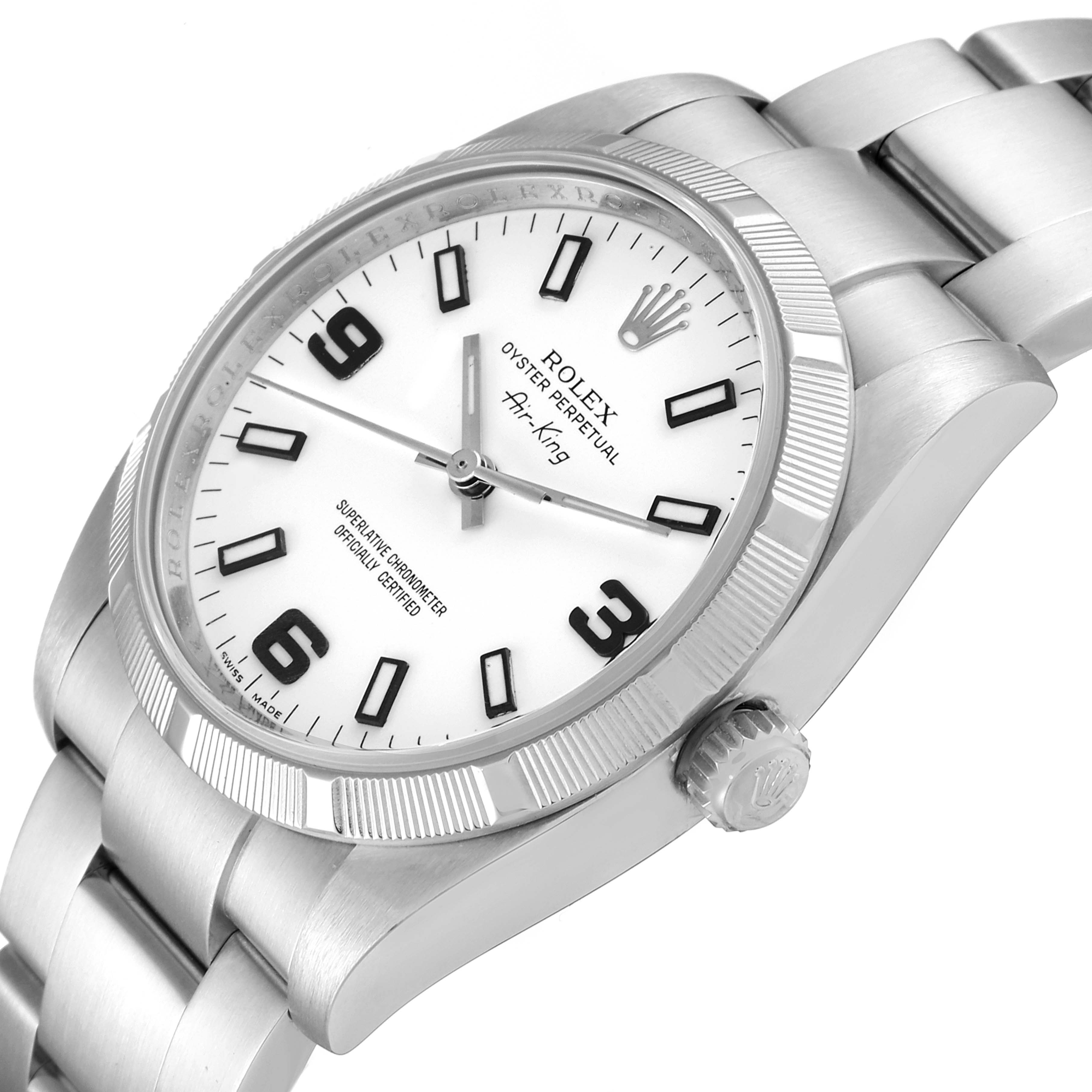 This image shows a close-up, angled view of a Rolex Air-King 114210 Men's Stainless Steel White Dial 114210 Men's Stainless Steel White Dial watch, highlighting the face, bezel, and part of the bracelet.