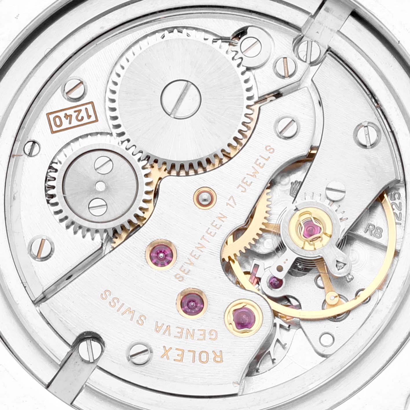 The image shows the internal mechanism of a Rolex Cellini 5240 Men's Platinum Mother of Pearl Dial 5240 Men's Platinum Mother of Pearl Dial watch, displaying gears, jewels, and other movement components.