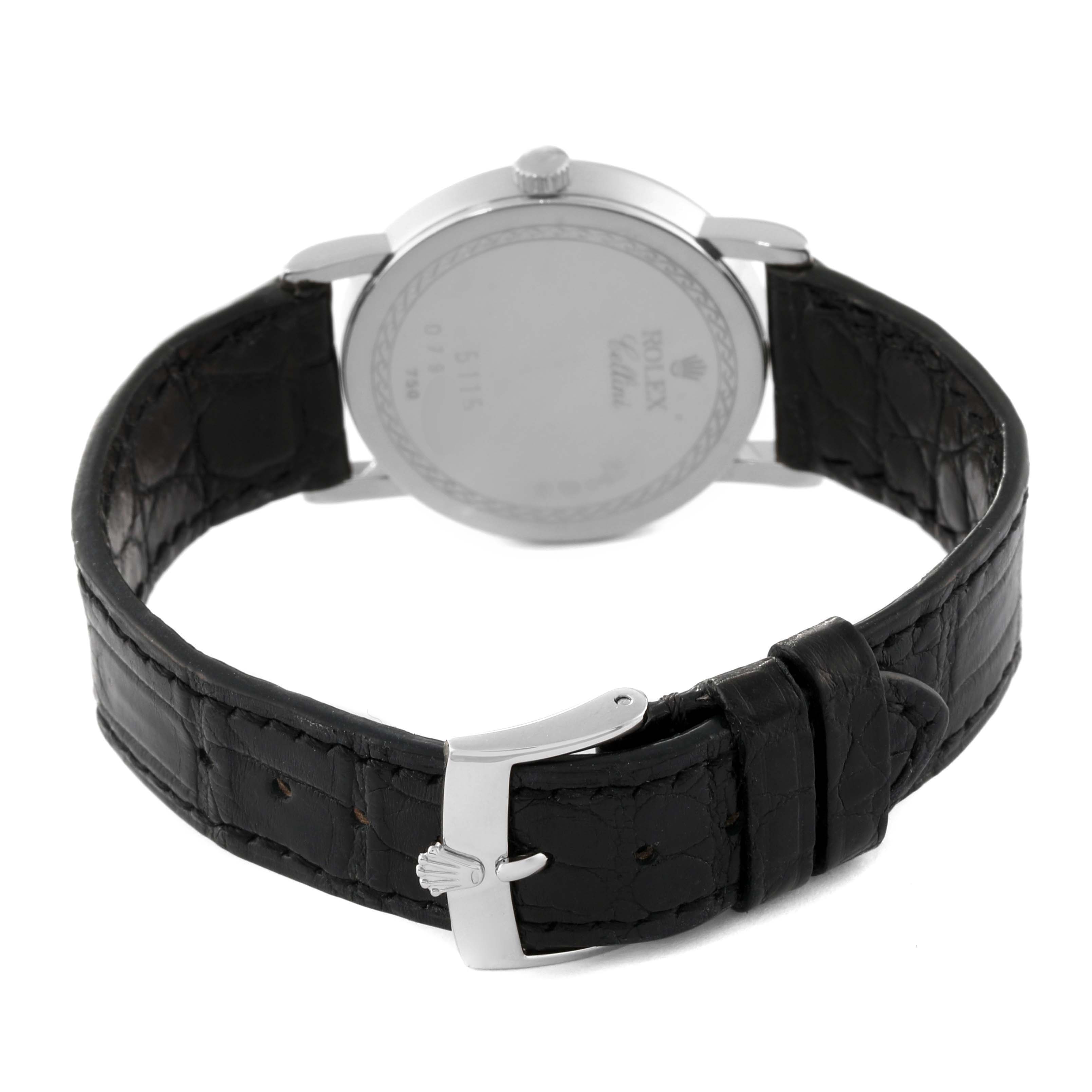 The image shows the back view of a Rolex Cellini 5115/9 Men's White Gold Silver Dial 5115/9 Men's White Gold Silver Dial watch, highlighting the leather strap and clasp.