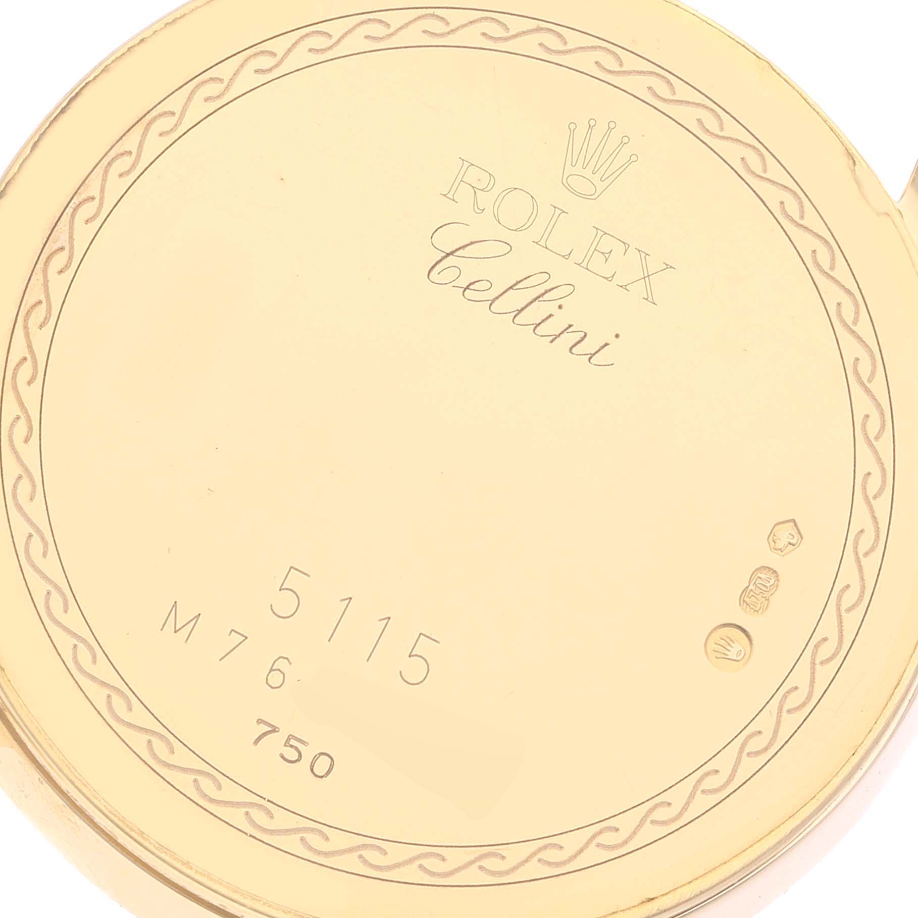 The image shows the inner case back of a Rolex Cellini 5115 Men's Yellow Gold Beige Dial 5115 Men's Yellow Gold Beige Dial model, engraved with its identifying marks and serial number.