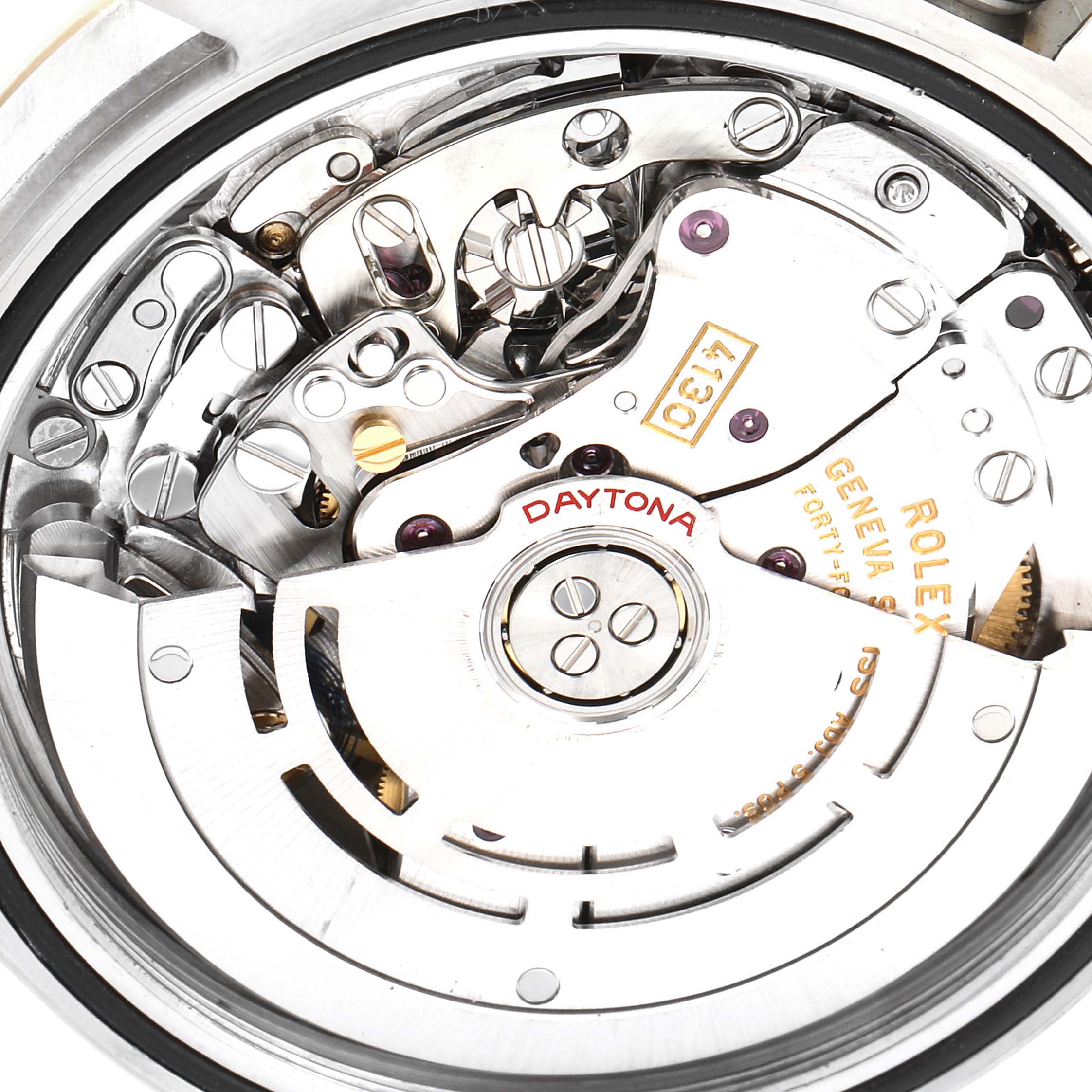 This image shows a detailed view of the internal mechanics and movement of a Rolex Daytona 116503 Men's Steel and Gold (two tone) Black Dial 116503 Men's Steel and Gold (two tone) Black Dial watch.