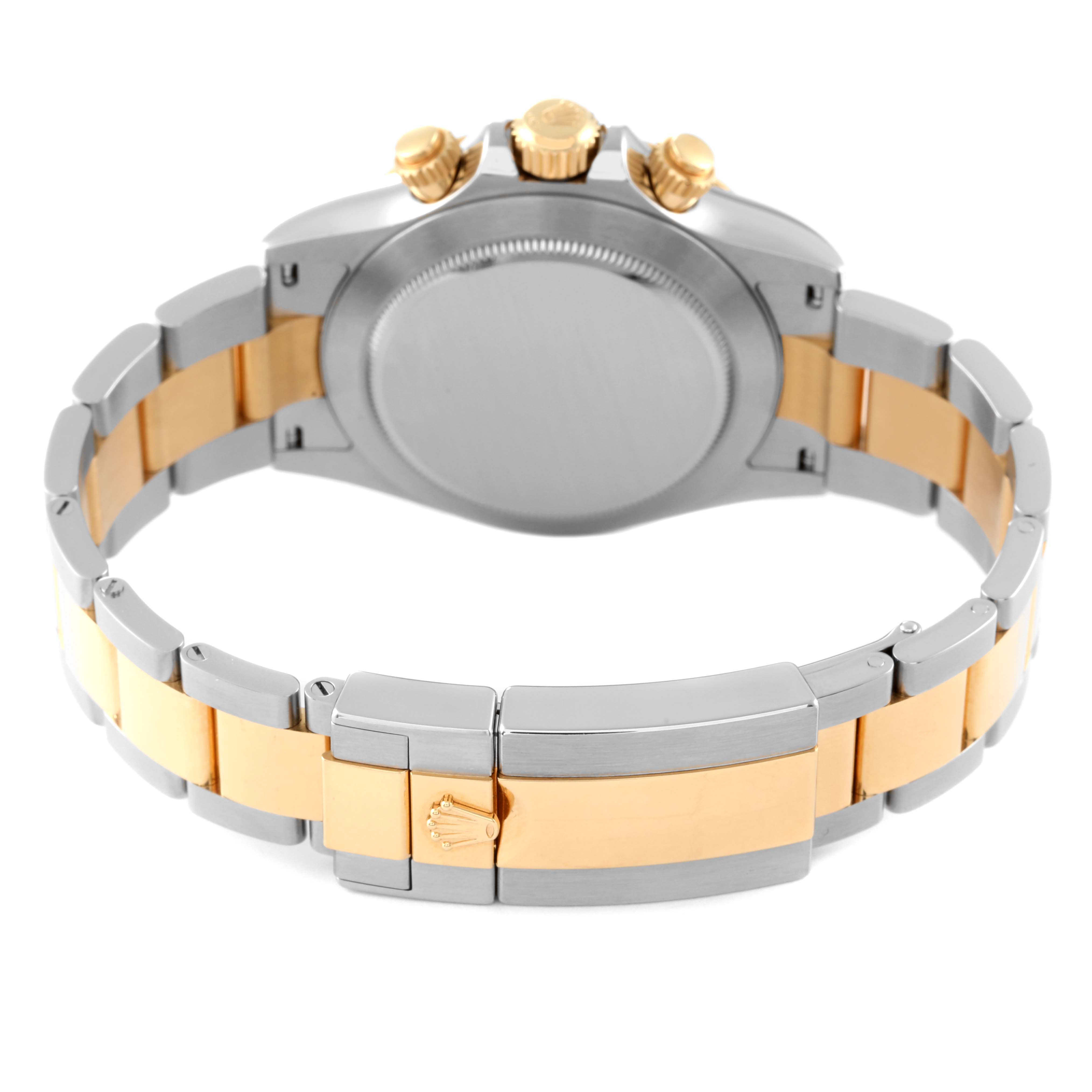 The back view of the Rolex Daytona 116503 Men's Steel and Gold (two tone) Black Dial 116503 Men's Steel and Gold (two tone) Black Dial model showcases the clasp, bracelet, and case back.