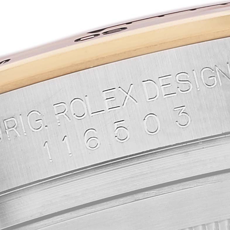 This image shows a close-up of the edge with engravings on the Rolex Daytona 116503 Men
s Steel and Gold (two tone) White Dial 116503 Men
s Steel and Gold (two tone) White Dial watch, including the model number.