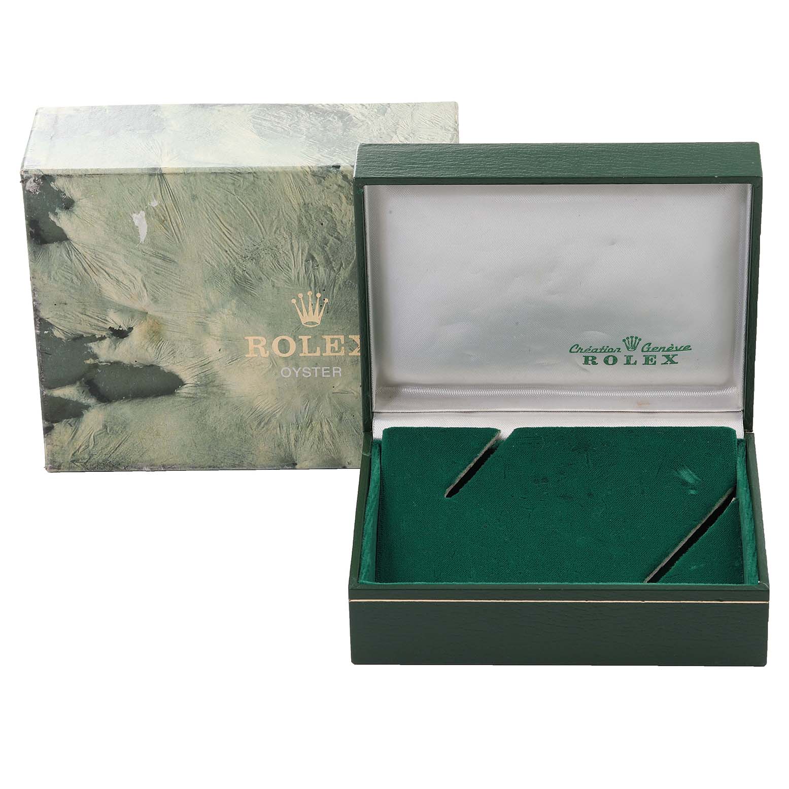 The image shows a green Rolex Oyster Date watch box, partially open, with the outer packaging visible.
