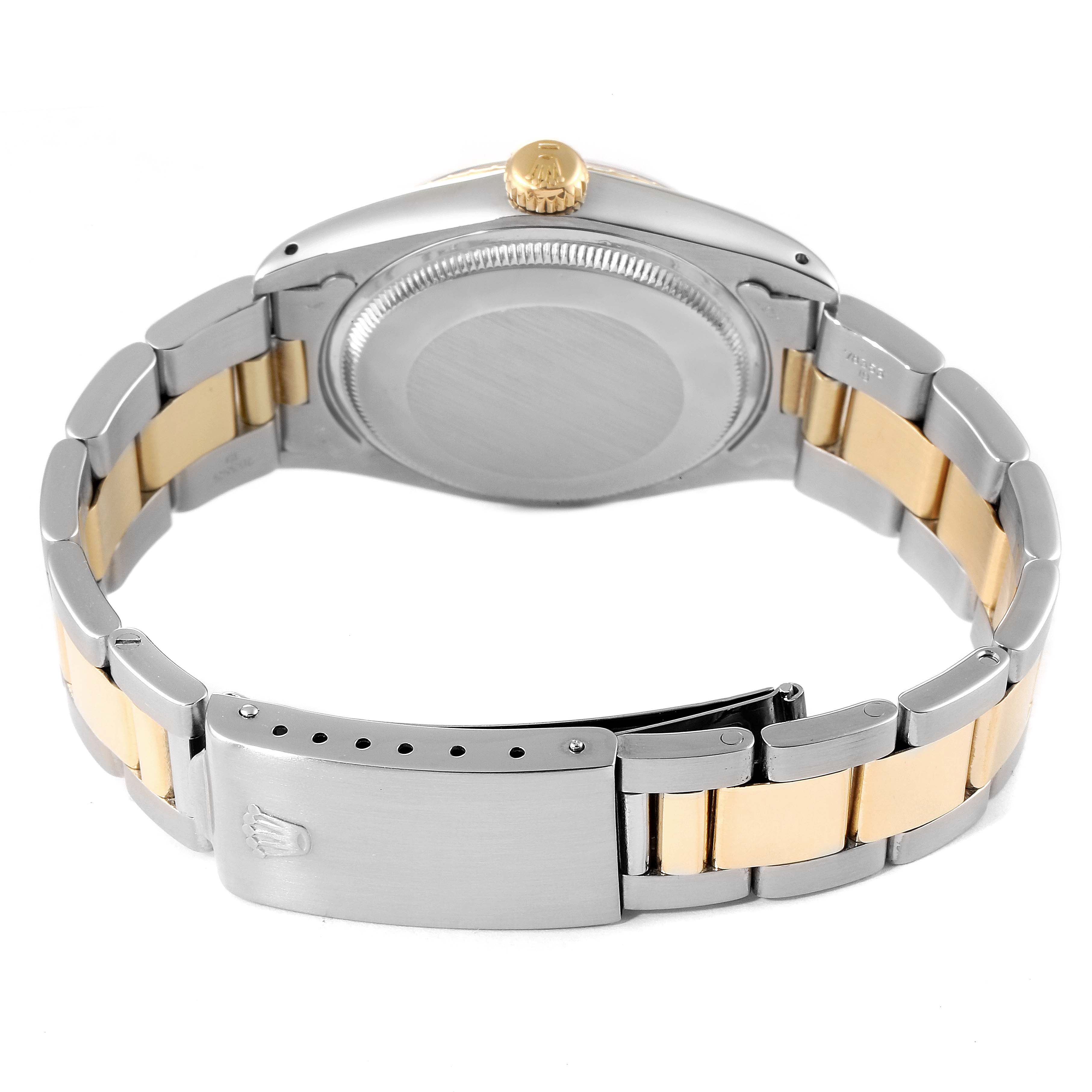 The image shows the backside and part of the bracelet of a Rolex Vintage Collection 1505 Men's Steel and Gold (two tone) Blue Dial 1505 Men's Steel and Gold (two tone) Blue Dial watch, highlighting the clasp and the caseback.