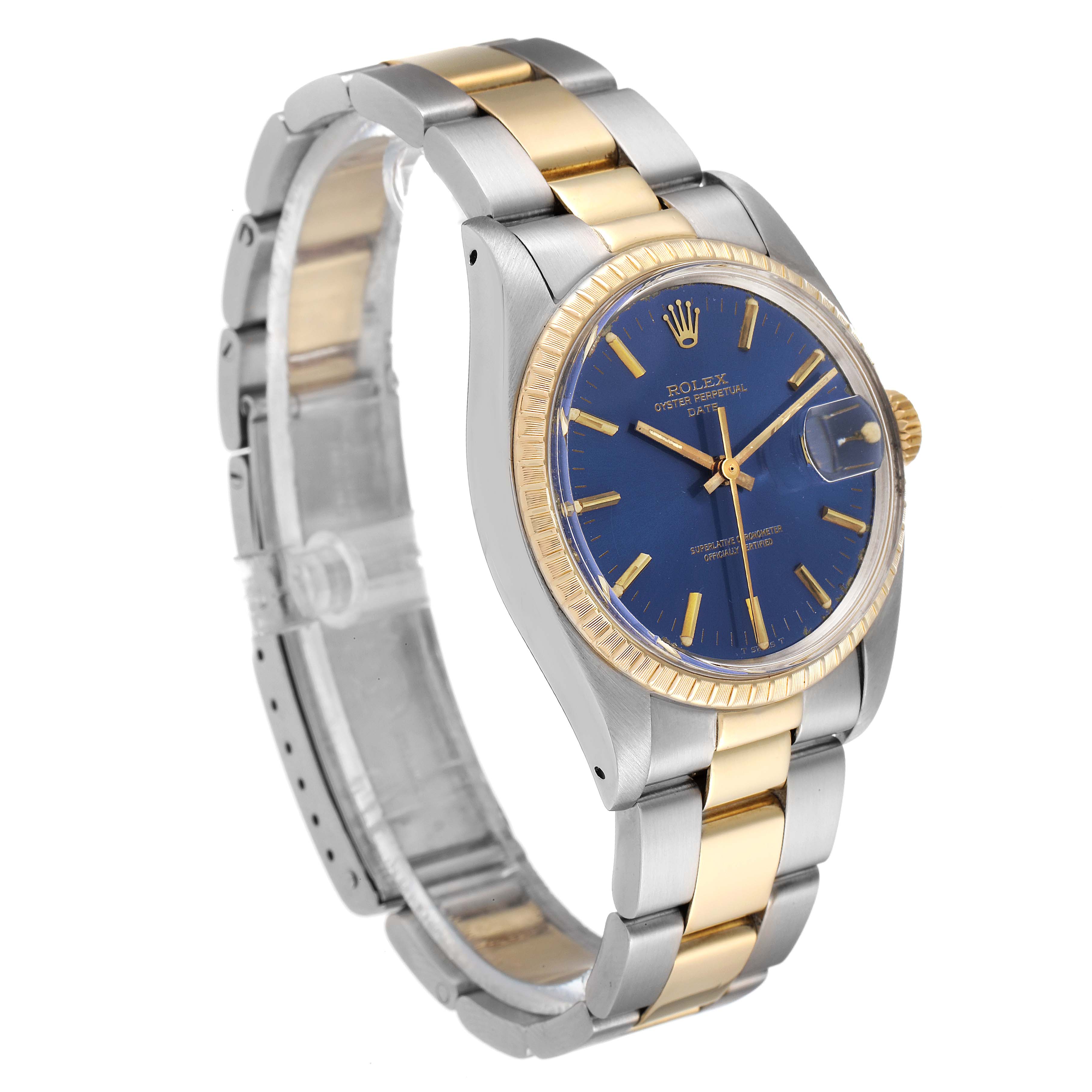 The Rolex Vintage Collection 1505 Men's Steel and Gold (two tone) Blue Dial 1505 Men's Steel and Gold (two tone) Blue Dial watch is shown at a three-quarter angle, displaying its blue dial, two-tone bracelet, and fluted bezel.