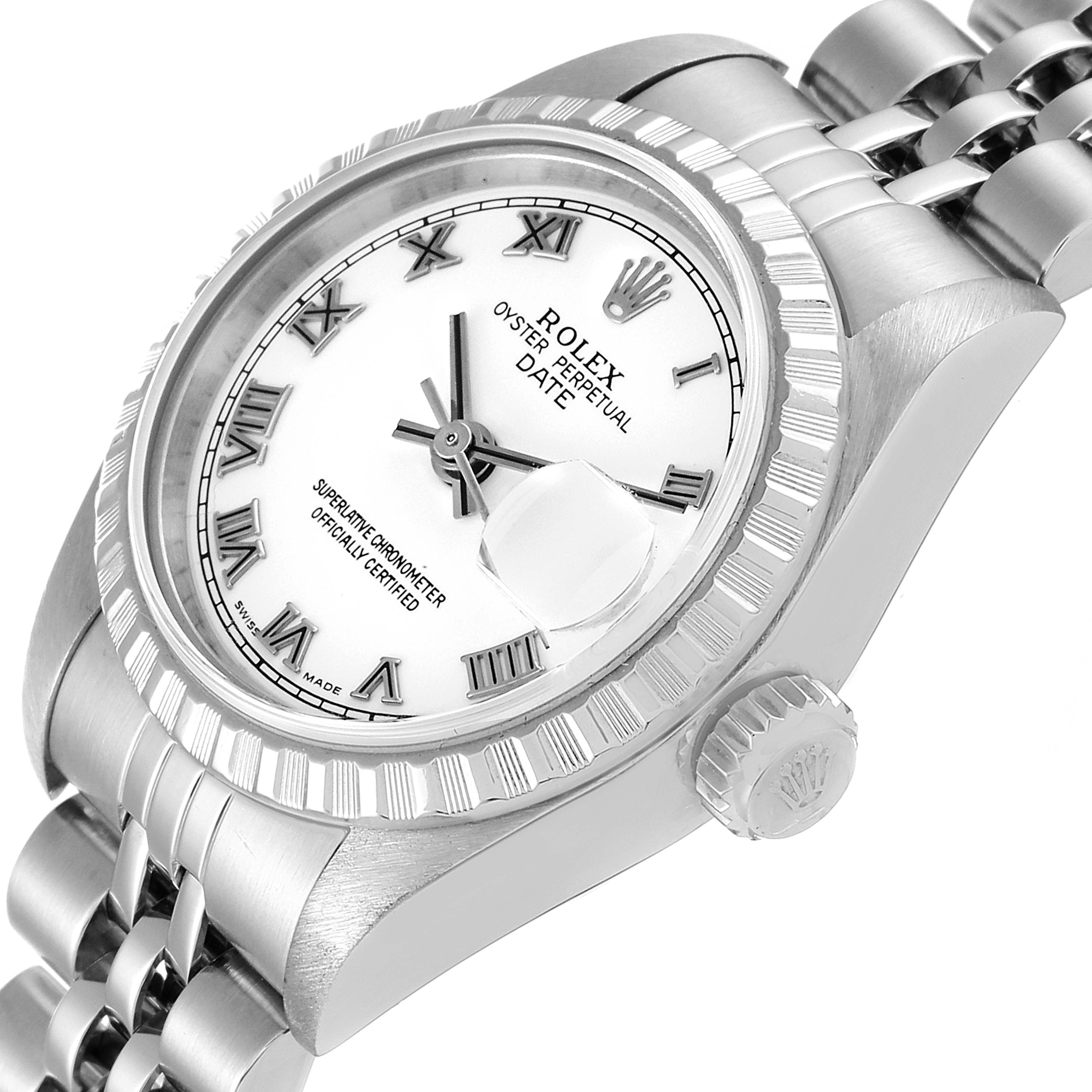 The image shows an angled view of a Rolex Oyster Perpetual Date watch featuring its dial, bezel, crown, and part of its bracelet.