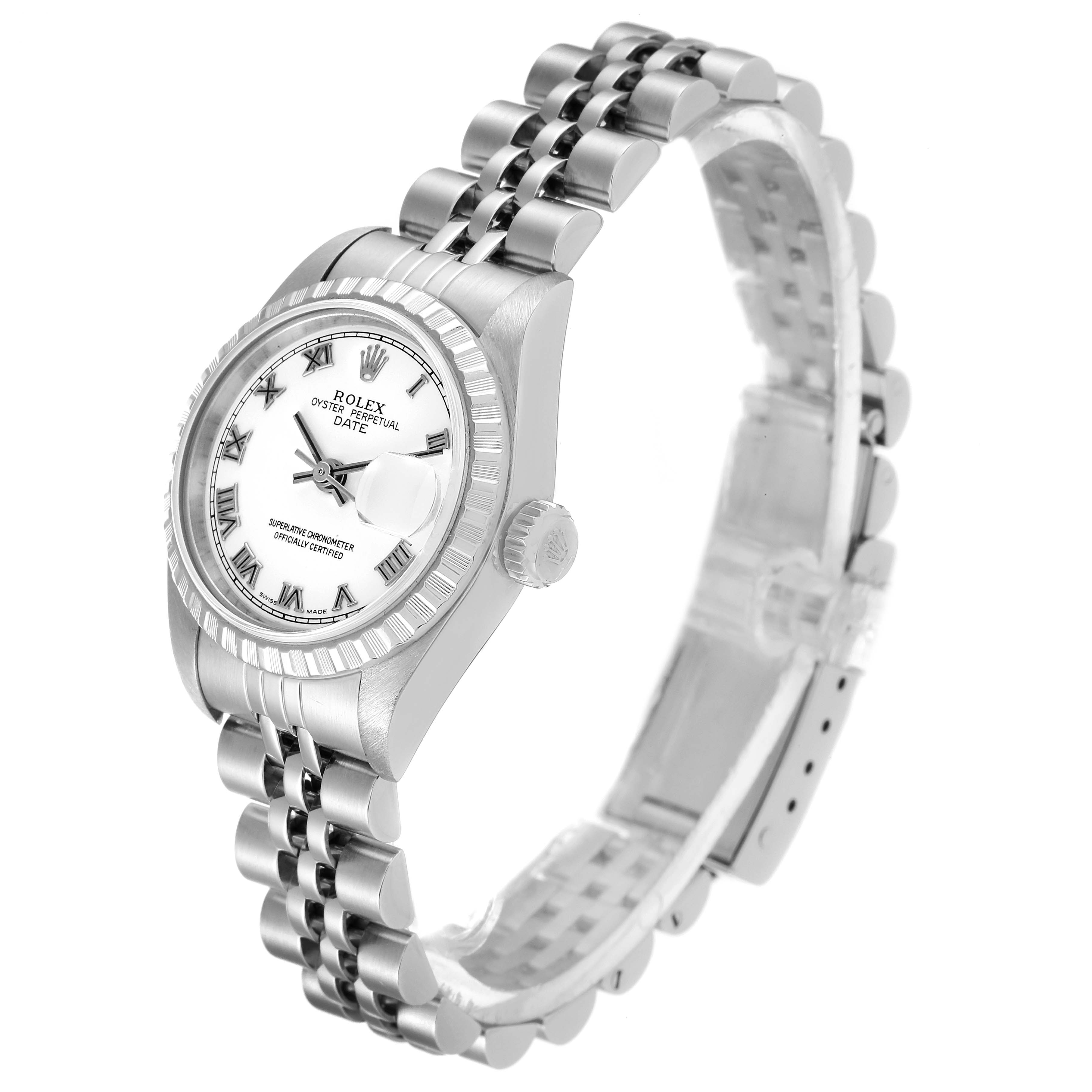 The image shows a Rolex Date 79240 Women
s Stainless Steel White Dial 79240 Women
s Stainless Steel White Dial model watch from a side angle, highlighting its face, bezel, crown, and bracelet.