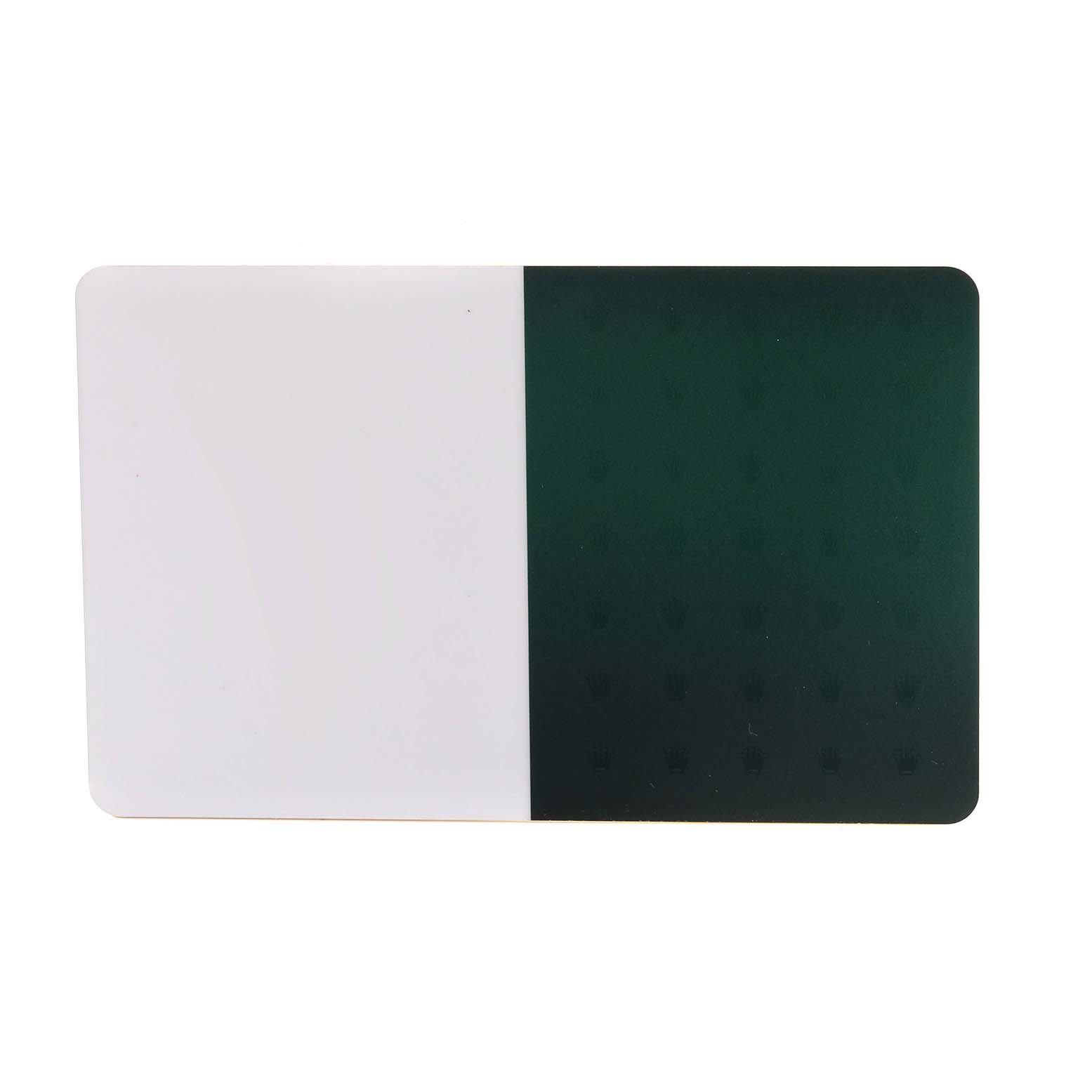 The image shows a rectangular, half white and half green Rolex card for a Mid-Size model, photographed from the top view.