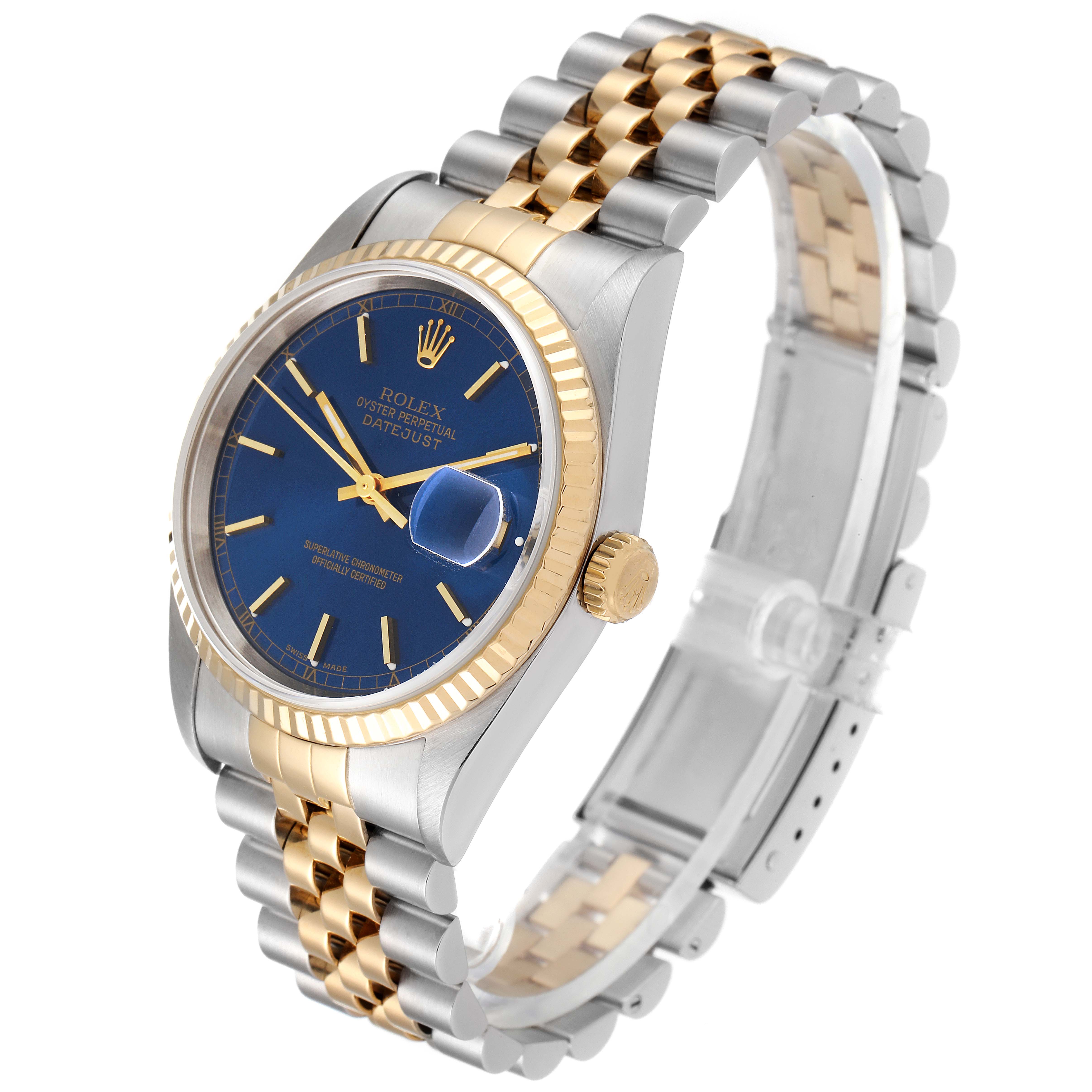 The Rolex Datejust 16233 Men's Steel and Gold (two tone) Blue Dial 16233 Men's Steel and Gold (two tone) Blue Dial watch is shown at an angled view, highlighting its blue dial, gold fluted bezel, and two-tone Jubilee bracelet.