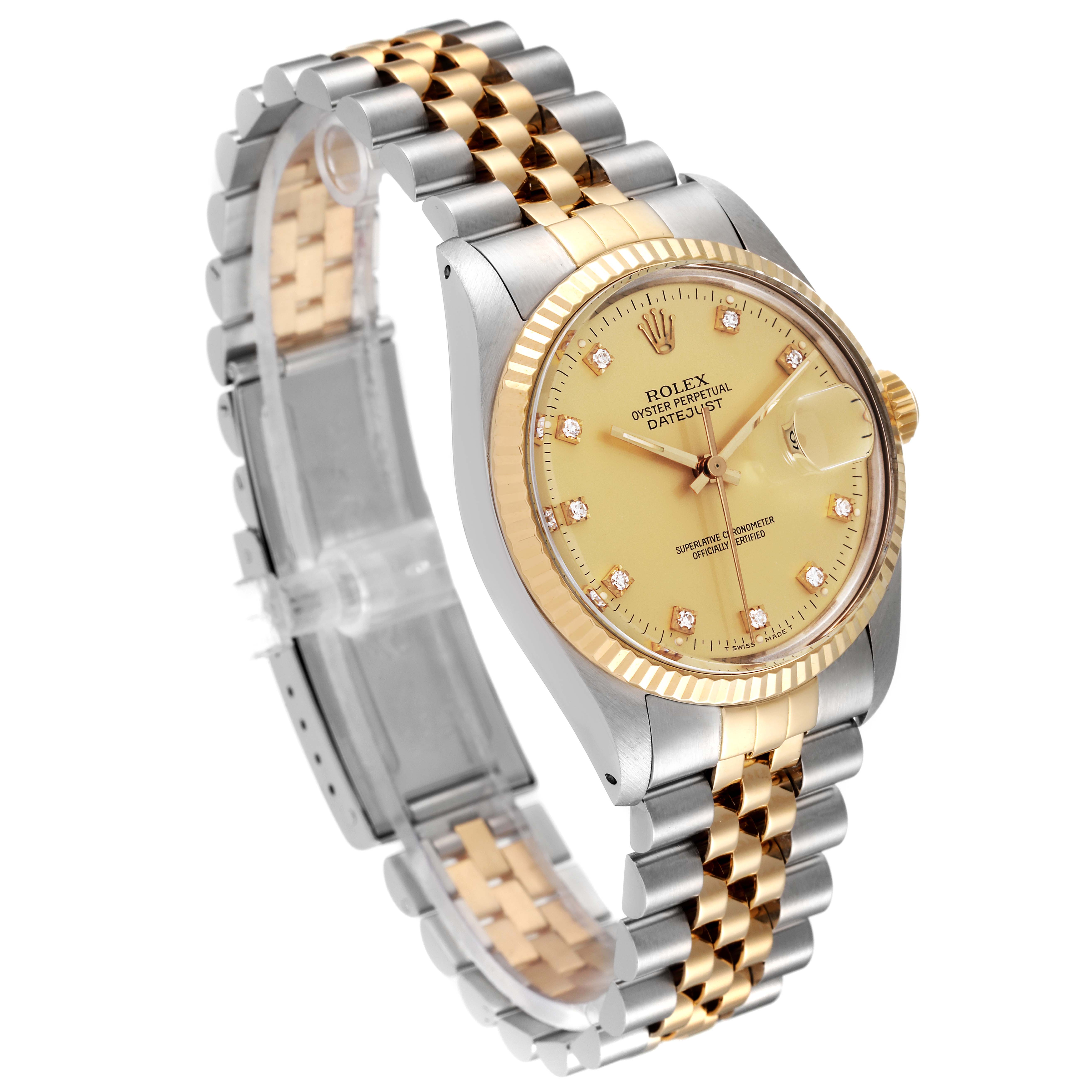 This image shows a Rolex Datejust 16013 Men
s Steel and Gold (two tone) Champagne Dial 16013 Men
s Steel and Gold (two tone) Champagne Dial watch at a three-quarter angle, highlighting the face, bezel, and two-tone bracelet.