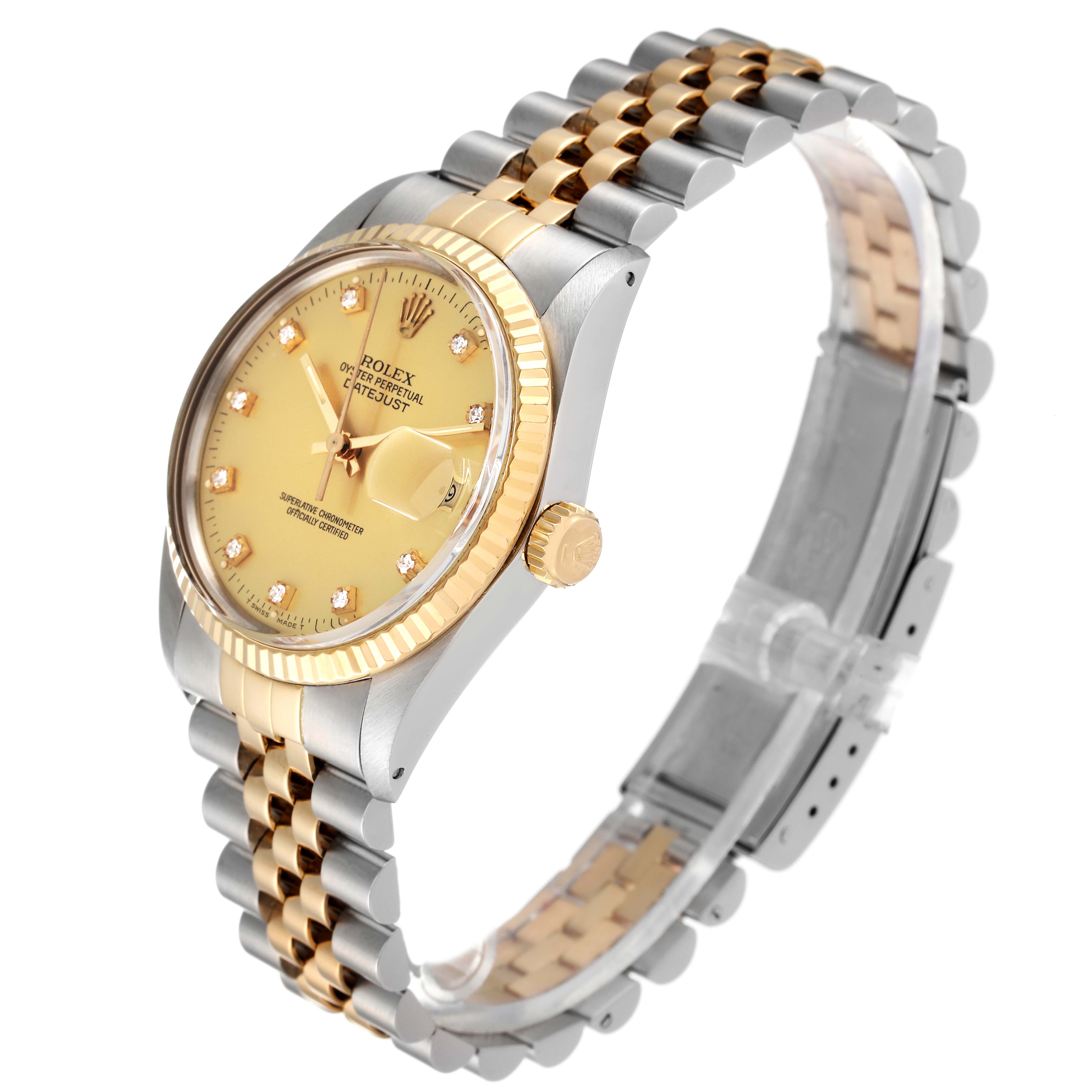 The image shows a Rolex Datejust 16013 Men
s Steel and Gold (two tone) Champagne Dial 16013 Men
s Steel and Gold (two tone) Champagne Dial watch at an angle, highlighting its gold dial, fluted bezel, and two-tone bracelet.