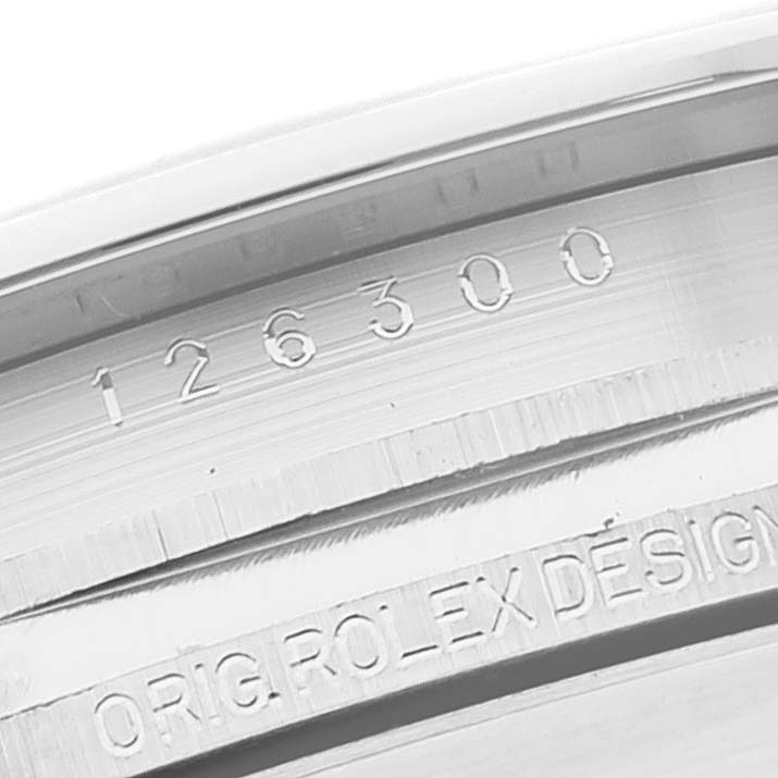 This image shows a close-up of the engraved bezel and serial numbers on the Rolex Datejust 41 126300 Men
s Stainless Steel Green Dial 126300 Men
s Stainless Steel Green Dial model.