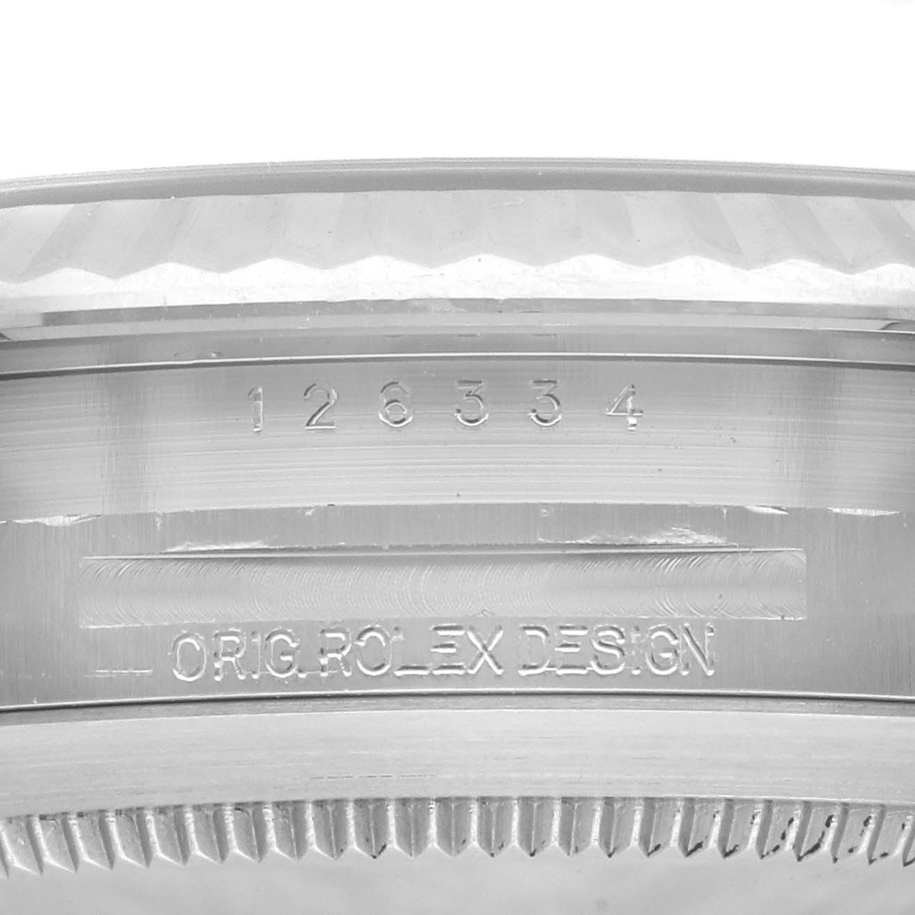 This image shows a close-up angle of the bezel and case side of a Rolex Datejust 41 126334 Men
s Stainless Steel Green Dial 126334 Men
s Stainless Steel Green Dial model, with visible engravings including the model number.