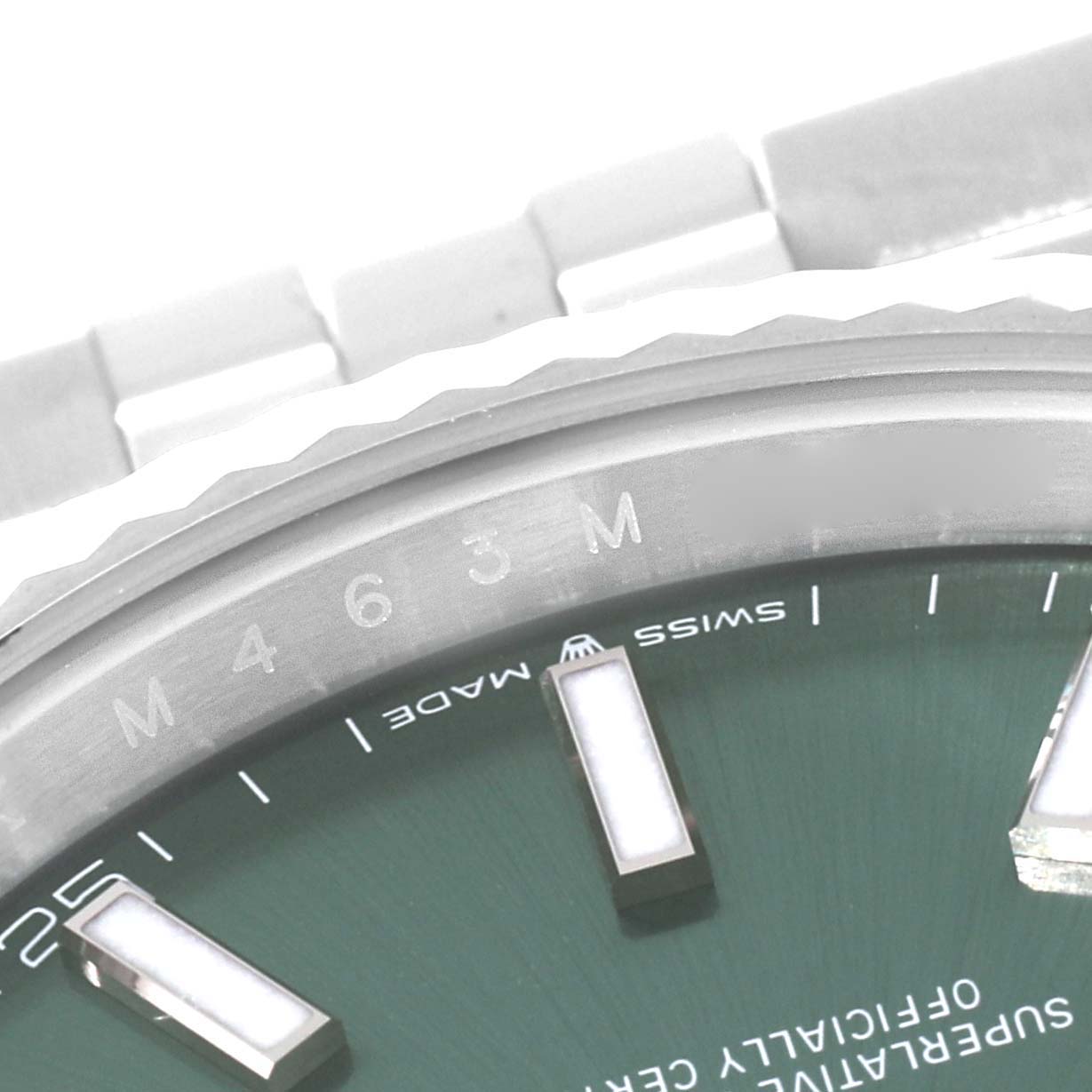 This image shows a close-up of the Rolex Datejust 41 126334 Men
s Stainless Steel Green Dial 126334 Men
s Stainless Steel Green Dial watch, highlighting its green dial, markers, and part of the bezel and bracelet.
