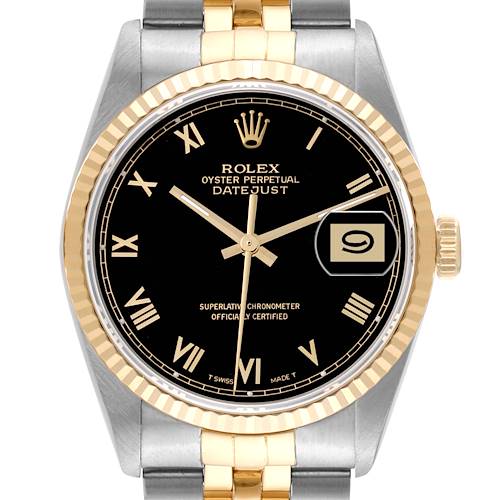 This image shows a front view of a Rolex Datejust watch, highlighting its black dial, gold Roman numeral markers, date window, two-tone band, and fluted bezel.