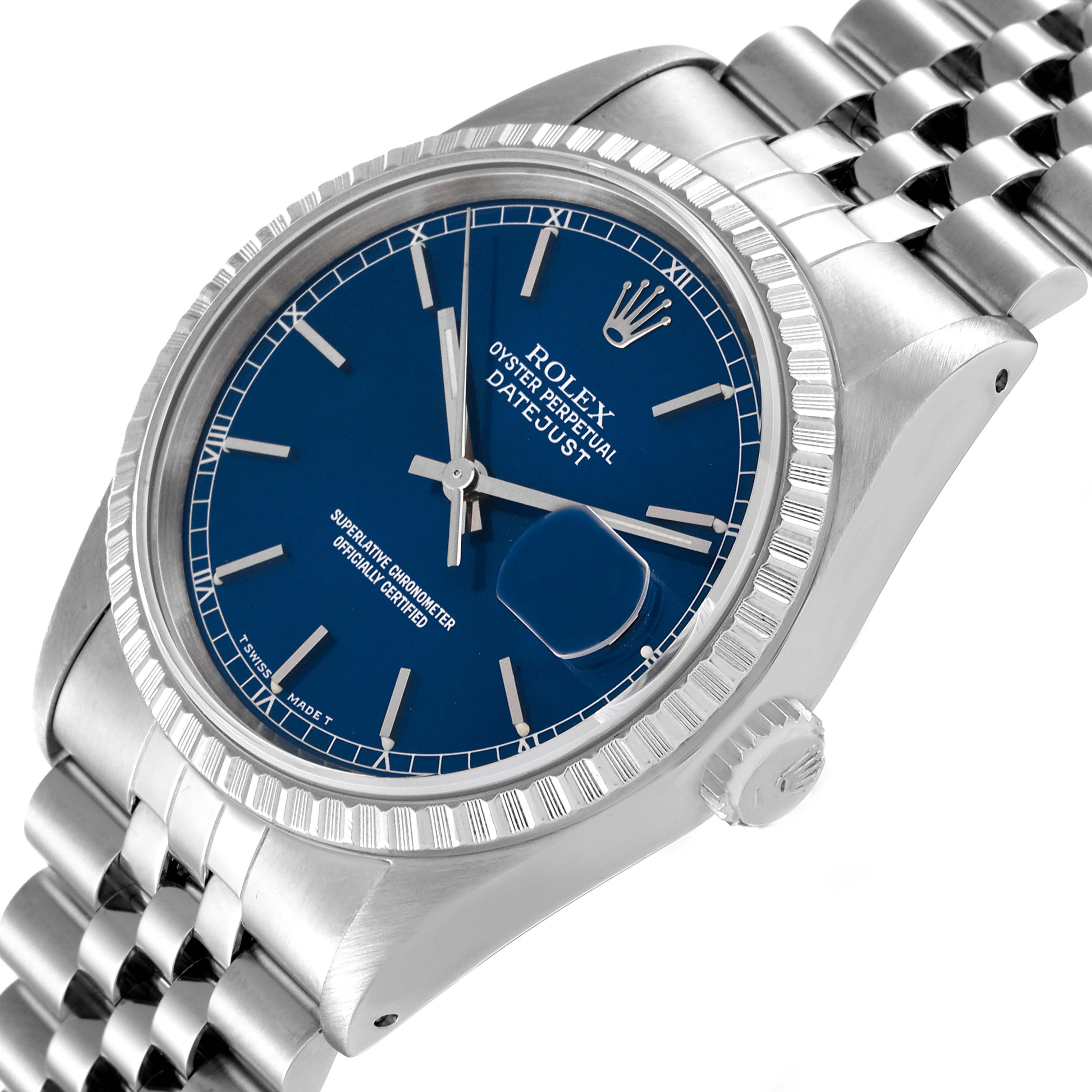 The Rolex Datejust 16220 Men's Stainless Steel Blue Dial 16220 Men's Stainless Steel Blue Dial watch is shown at an angle highlighting its blue dial, fluted bezel, and Jubilee bracelet.