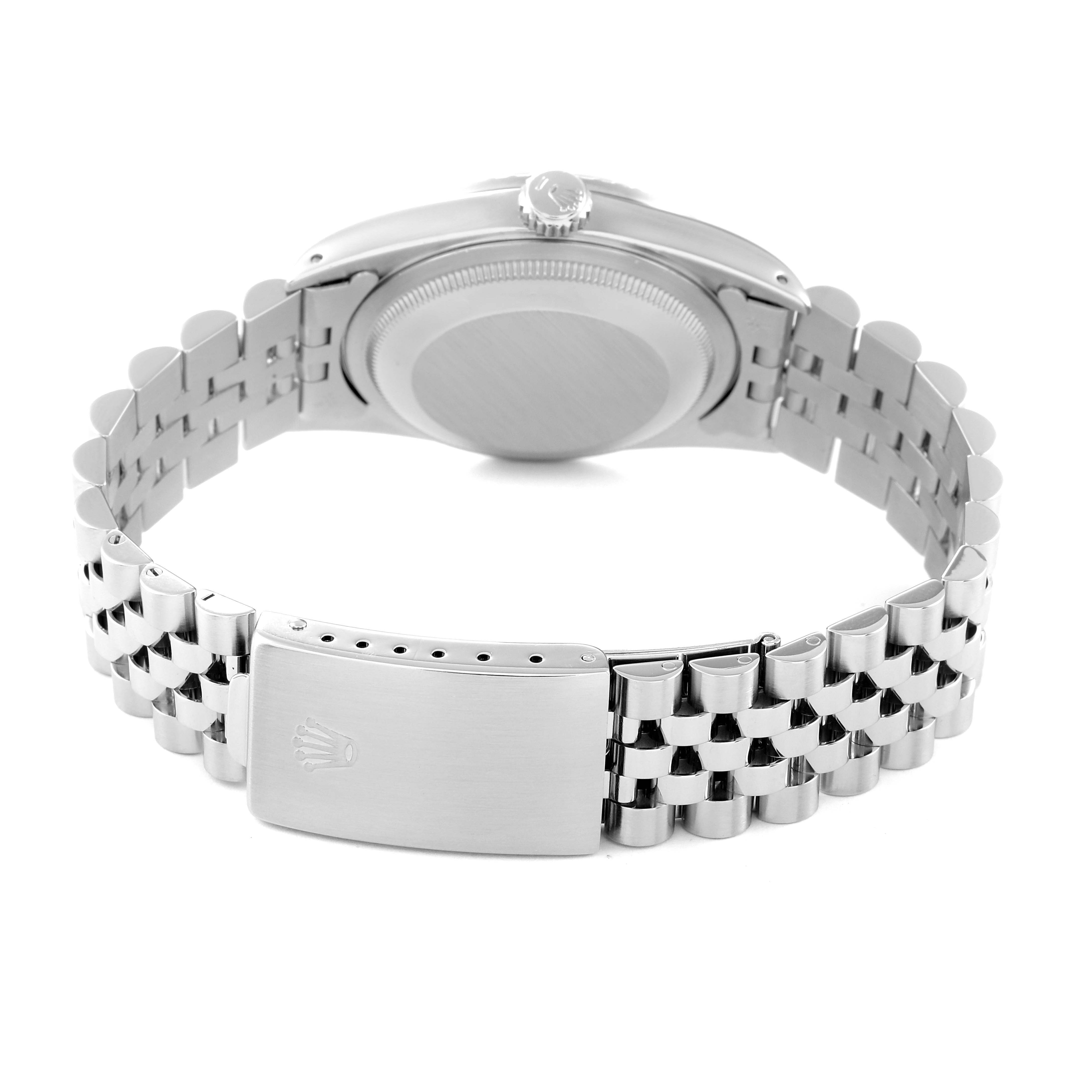 The image shows the backside of a Rolex Datejust 16220 Men's Stainless Steel Blue Dial 16220 Men's Stainless Steel Blue Dial watch, focusing on the case back and Jubilee bracelet with the clasp visible.