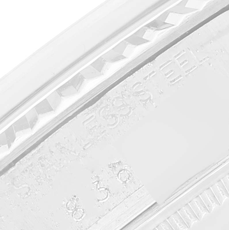 This image shows a close-up angle of the engraving on the bezel of the Vintage Collection model by Rolex.