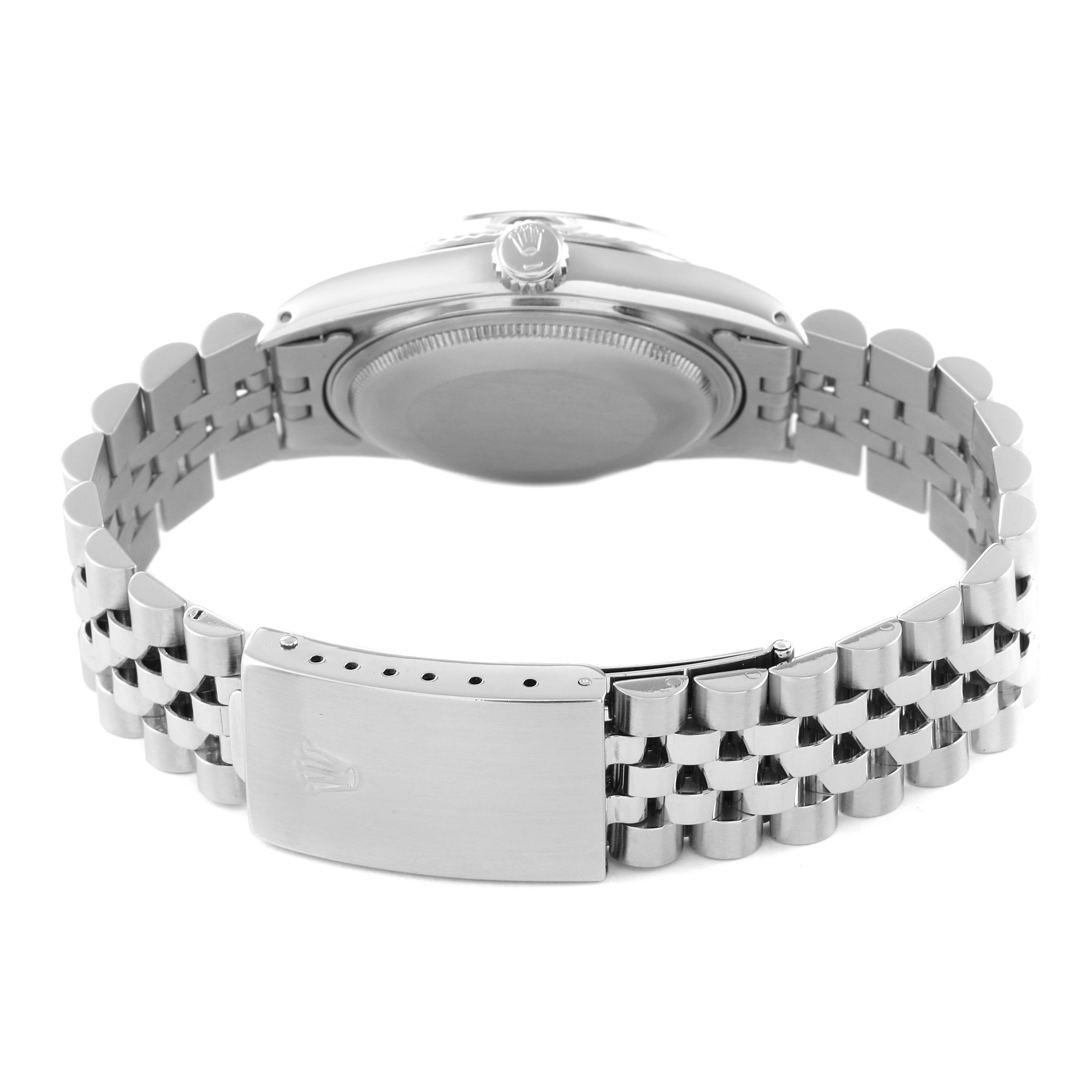 The image shows the back case, bracelet, and clasp of a Vintage Collection model by Rolex from a rear angle.