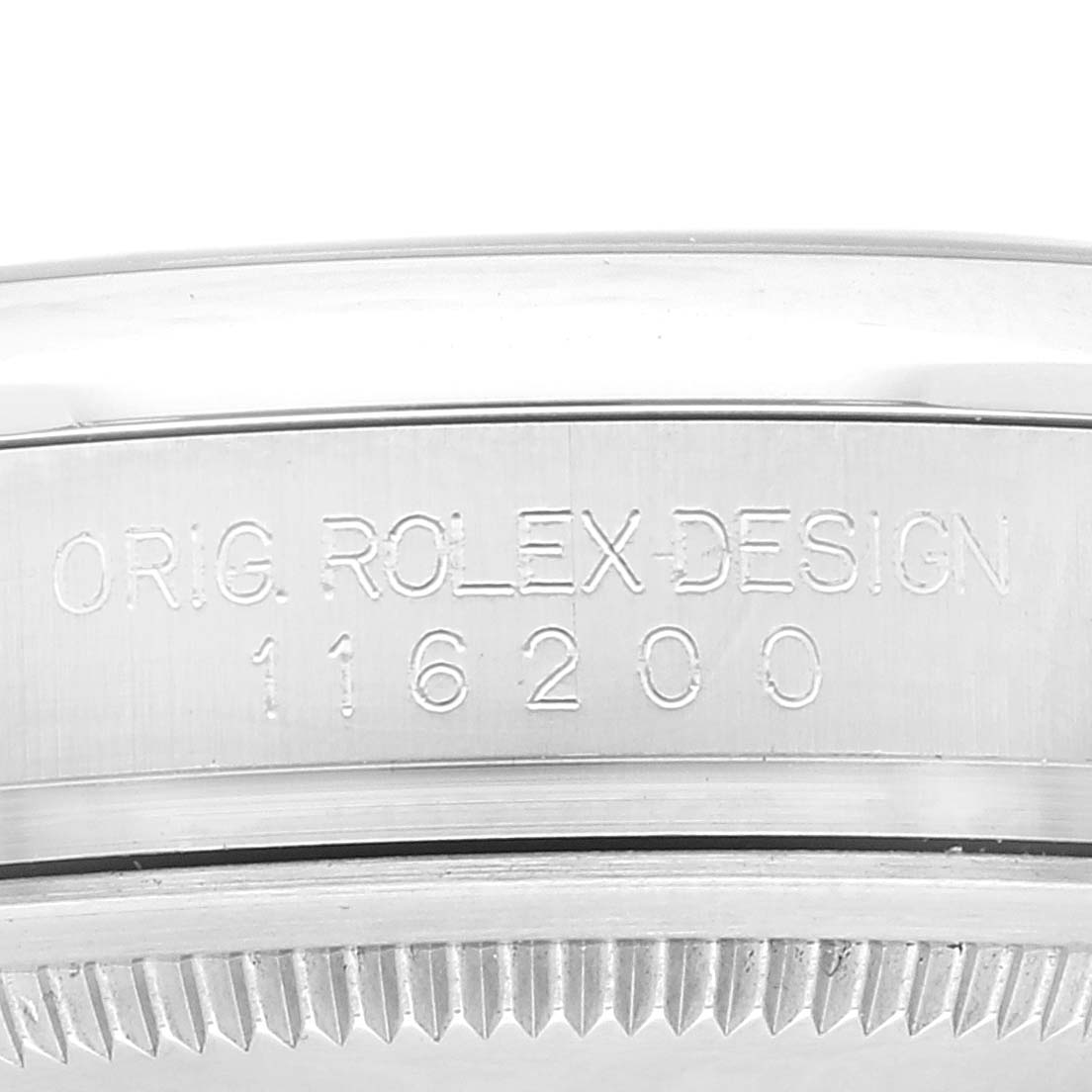 This image shows a close-up side view of the Rolex Datejust 116200 Men's Stainless Steel Blue Dial 116200 Men's Stainless Steel Blue Dial's case with the engraving "ORIG. ROLEX DESIGN 116200"  visible.