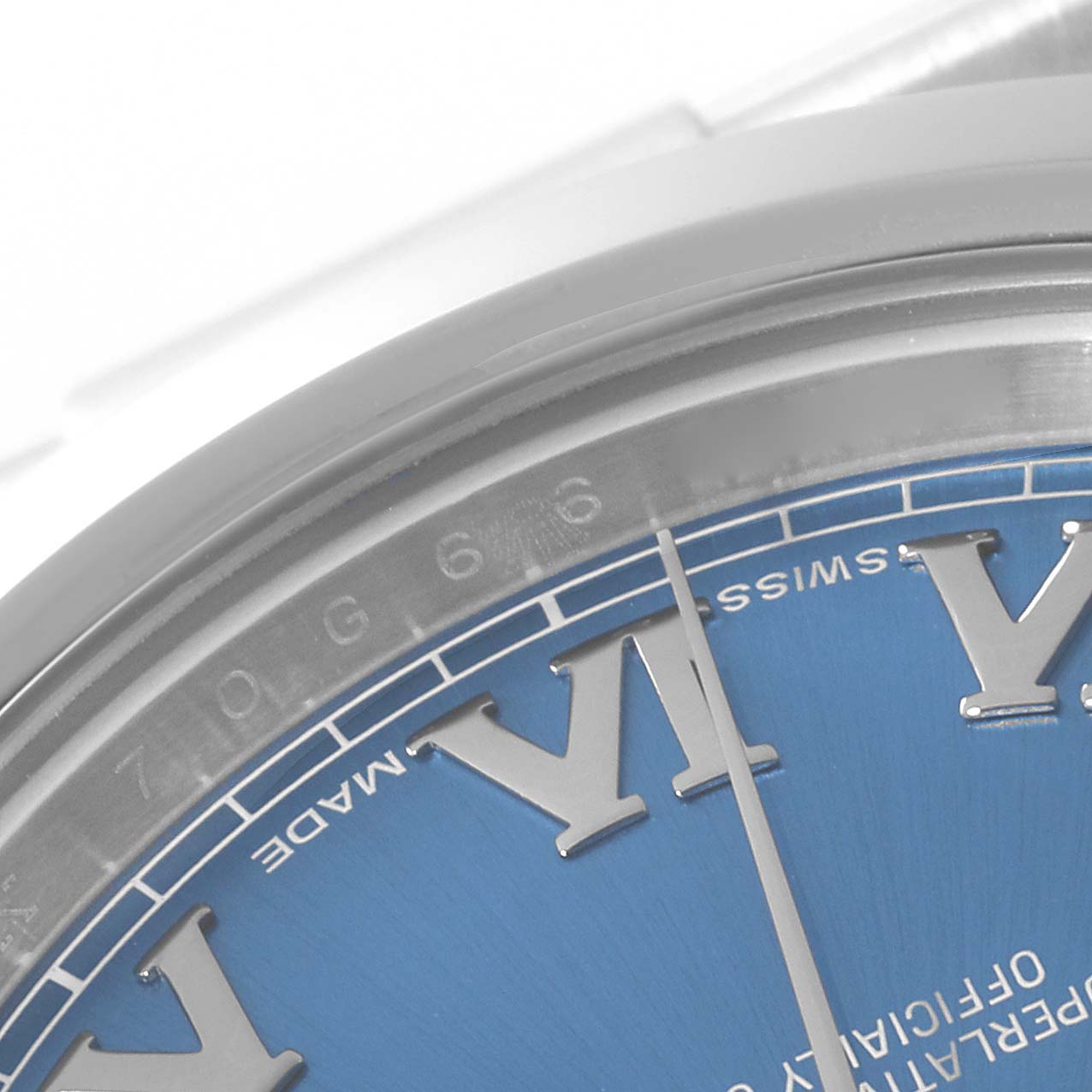 This close-up image shows the upper part of the dial and bezel of a Rolex Datejust 41 116300 Men
s Stainless Steel Blue Dial 116300 Men
s Stainless Steel Blue Dial, featuring Roman numerals and the "SWISS MADE" text.