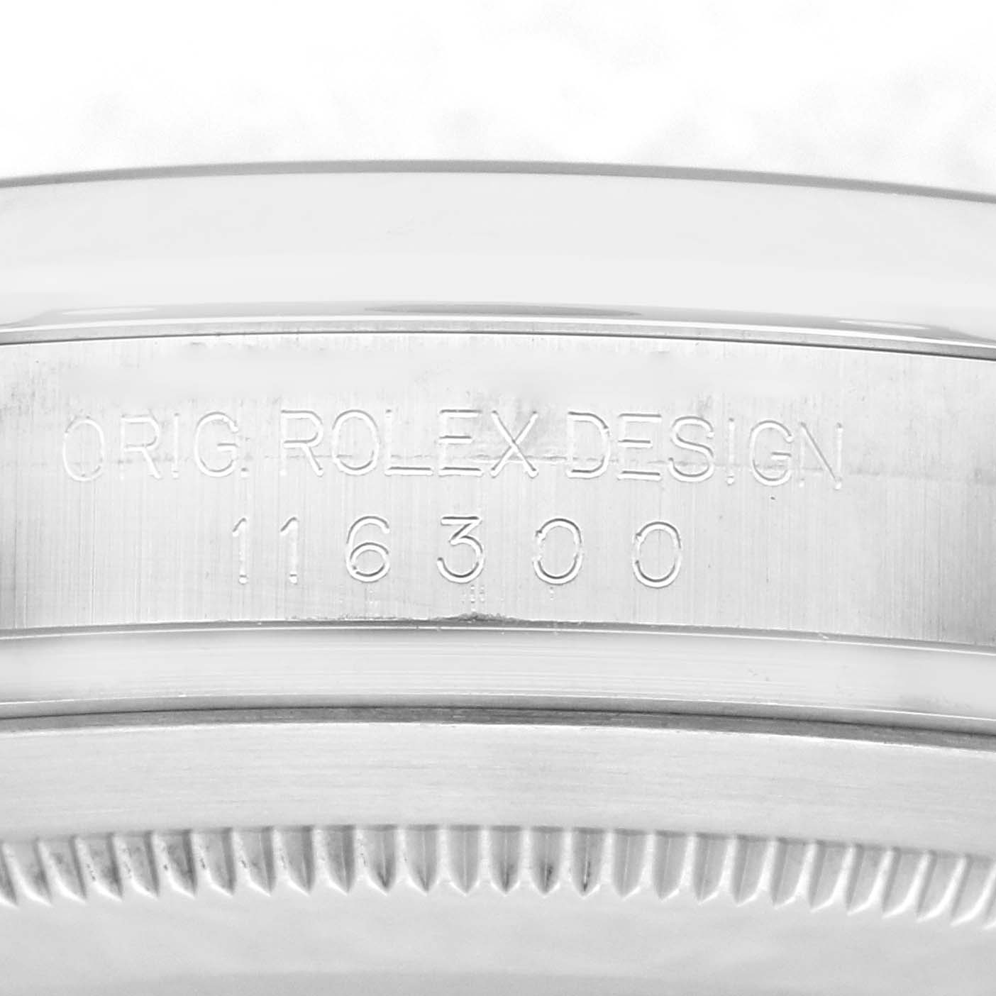 The image shows a close-up of the engraved case side of the Rolex Datejust 41 116300 Men
s Stainless Steel Blue Dial 116300 Men
s Stainless Steel Blue Dial, highlighting the model number "116300."