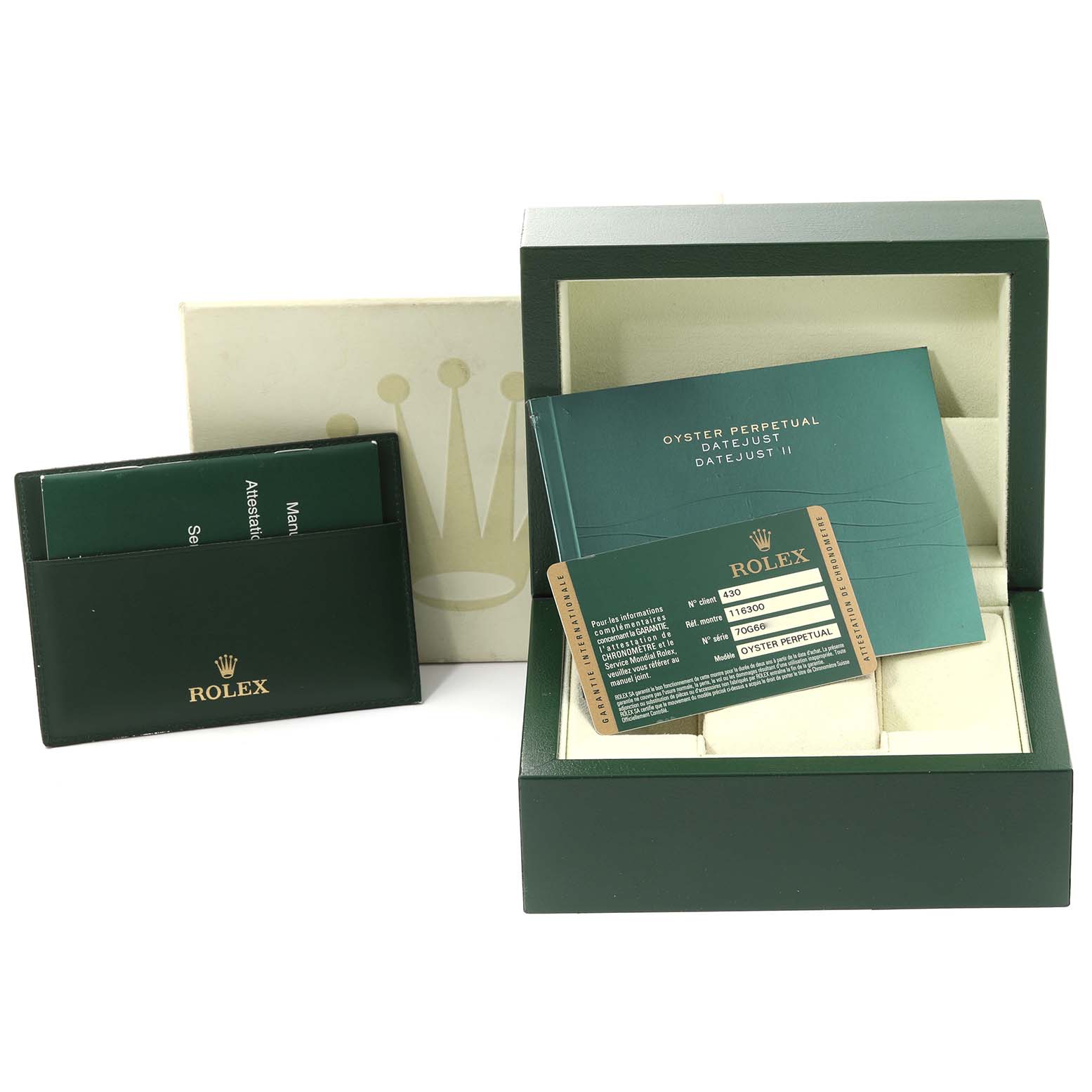 This image shows the packaging and documentation for the Rolex Datejust 41 116300 Men
s Stainless Steel Blue Dial 116300 Men
s Stainless Steel Blue Dial, including the box, manual, and warranty card.