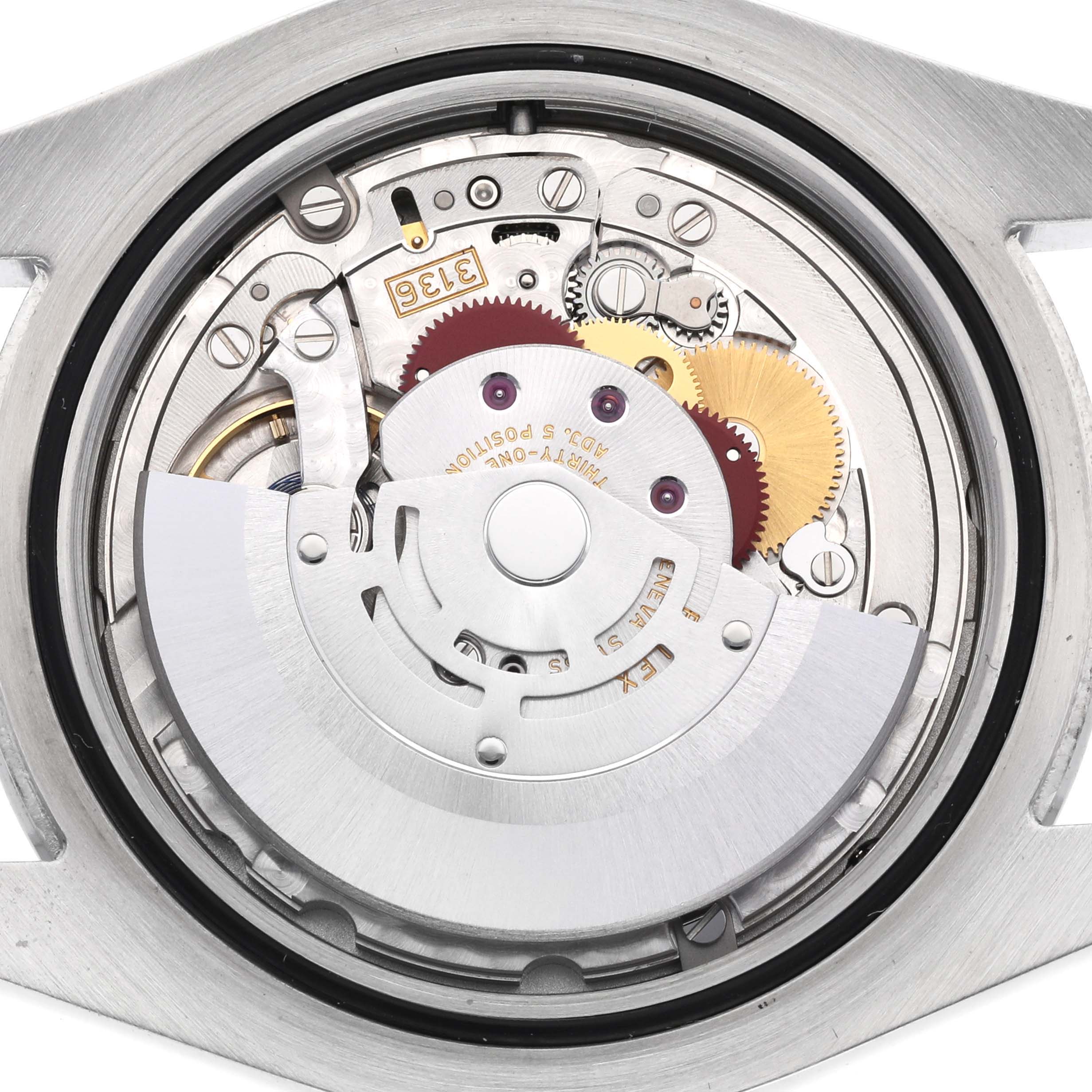 This image shows the internal movement mechanism of a Rolex Datejust 41 116300 Men
s Stainless Steel Blue Dial 116300 Men
s Stainless Steel Blue Dial model from a back angle.