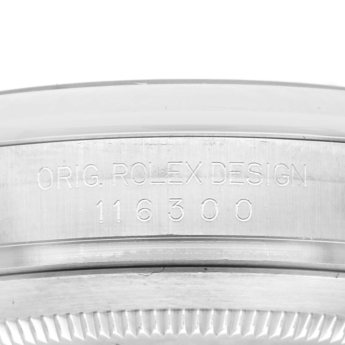 This image shows a close-up of the engraved case back edge of a Rolex Datejust 41 116300 Men's Stainless Steel Blue Dial 116300 Men's Stainless Steel Blue Dial, displaying the model number 116300.