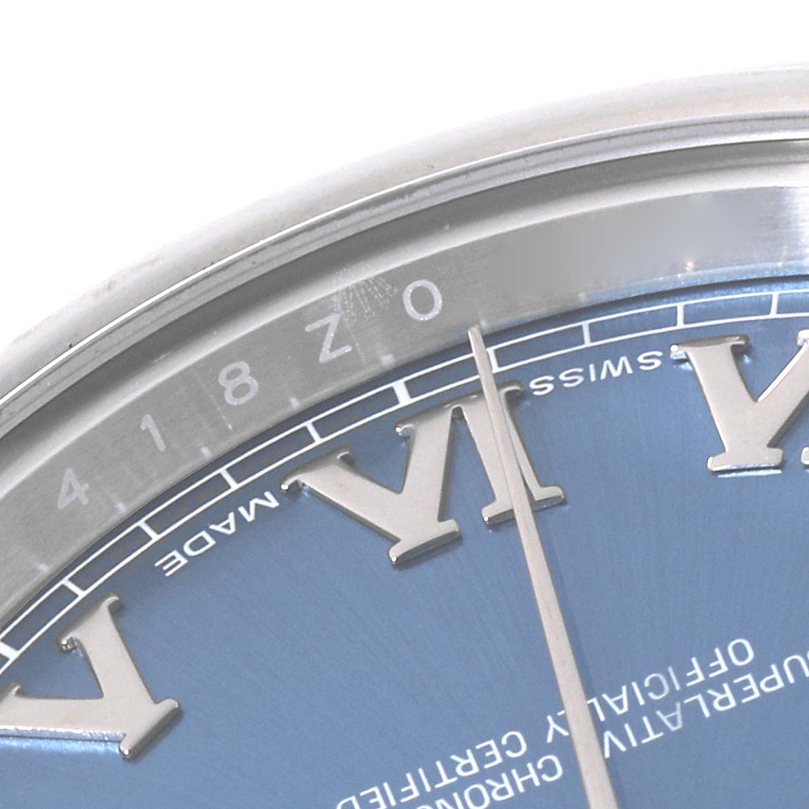 This is a close-up angle showing part of the dial and bezel of the Rolex Datejust 41 116300 Men's Stainless Steel Blue Dial 116300 Men's Stainless Steel Blue Dial model, featuring Roman numerals.