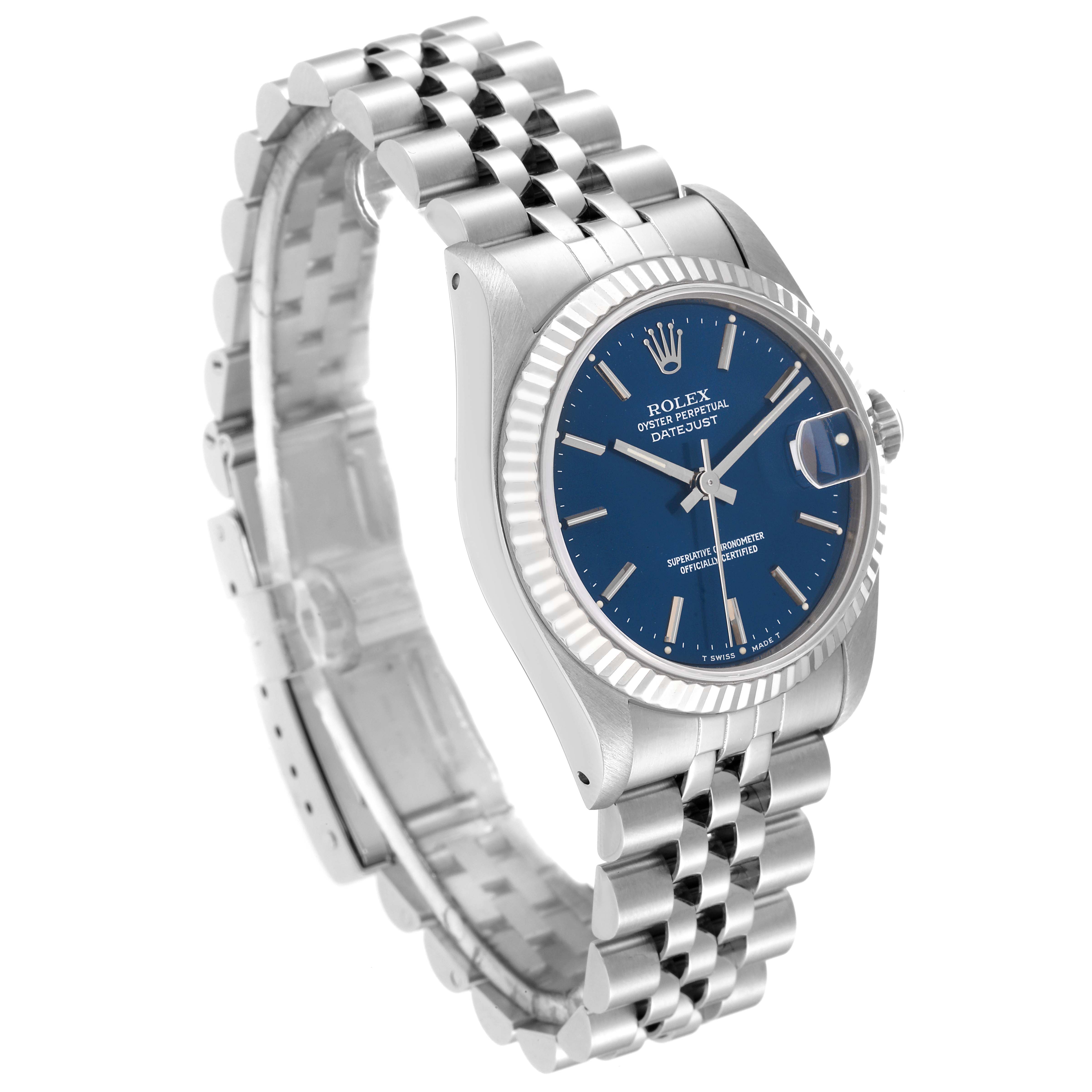 The Rolex Mid-Size 68274 Women's Stainless Steel Blue Dial 68274 Women's Stainless Steel Blue Dial Oyster Perpetual Datejust watch is shown at an angle, highlighting the blue dial, stainless steel case, and jubilee bracelet.