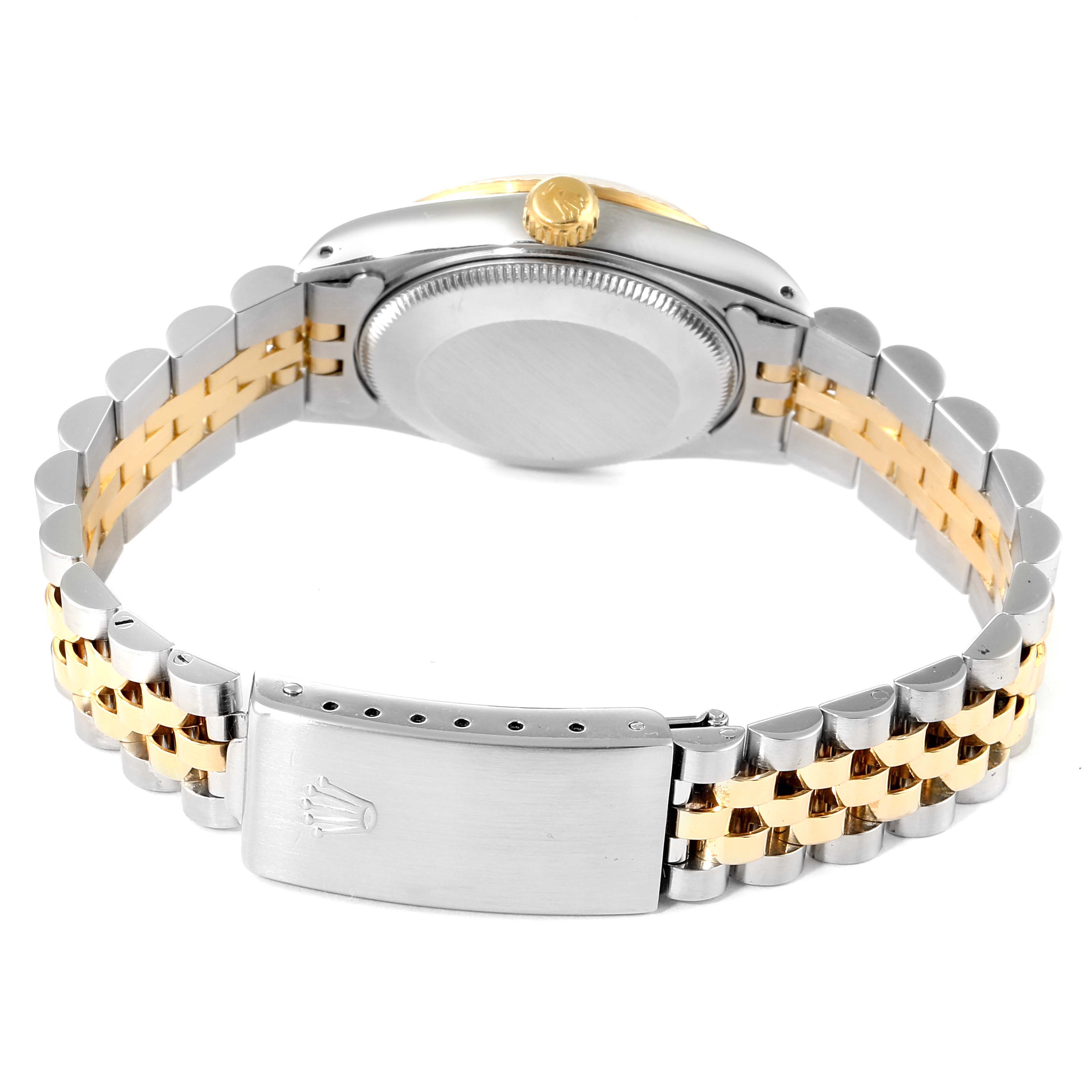 This Rolex Mid-Size 68273 Women's Steel and Gold (two tone) Blue Dial 68273 Women's Steel and Gold (two tone) Blue Dial watch is shown from the back, displaying the clasp, bracelet, and case back.