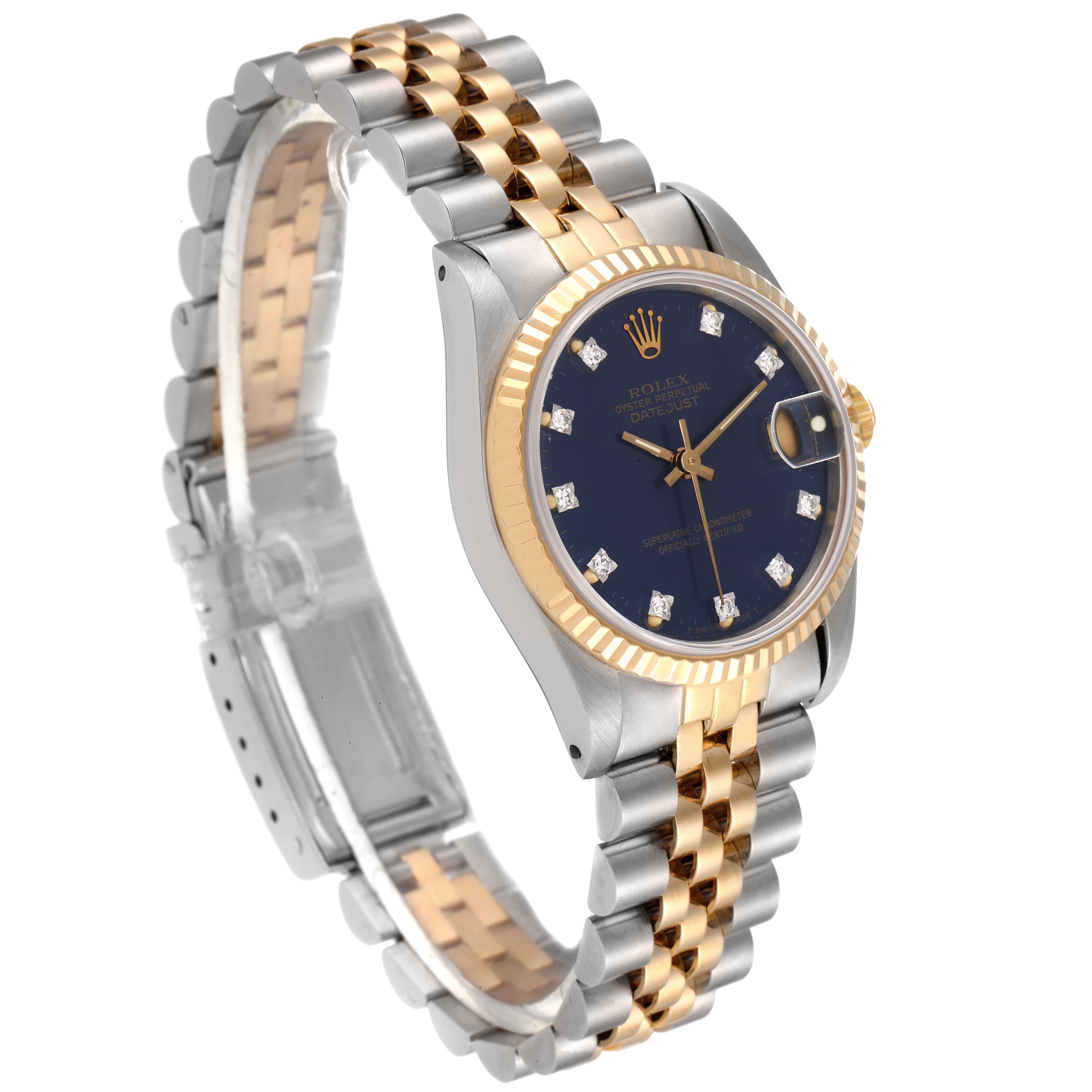 This image shows a side and front angle of the Rolex Datejust Mid-Size watch, featuring a blue dial, diamond markers, and a two-tone bracelet.