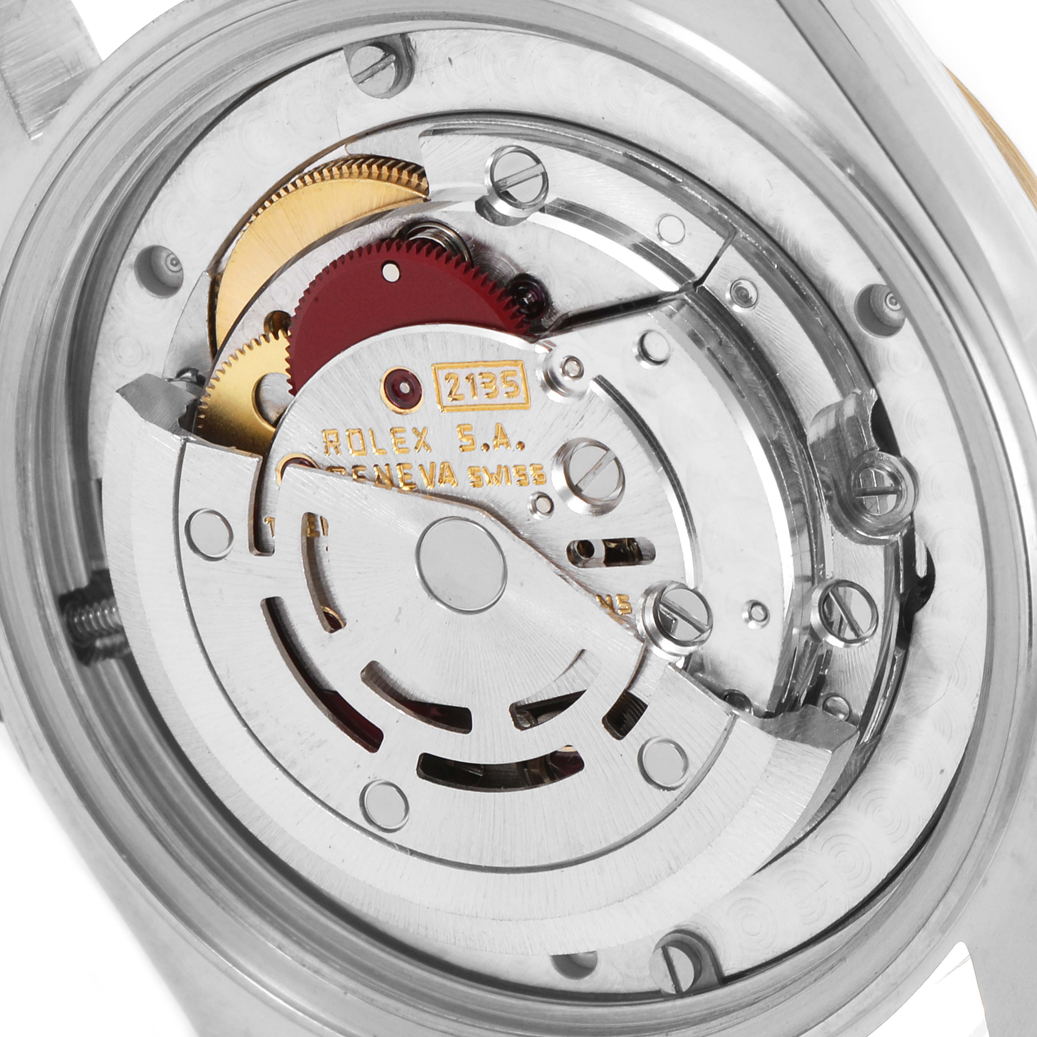 The image shows the internal mechanism of a Rolex Mid-Size 68273 Women's Steel and Gold (two tone) Champagne Dial 68273 Women's Steel and Gold (two tone) Champagne Dial model from the back, displaying the intricate parts of the movement.