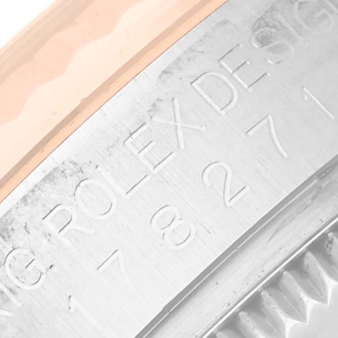 The image shows a close-up of the engraved side of the bezel on a Rolex Mid-Size 178271 Women's Steel and Gold (two tone) Silver Dial 178271 Women's Steel and Gold (two tone) Silver Dial model watch.