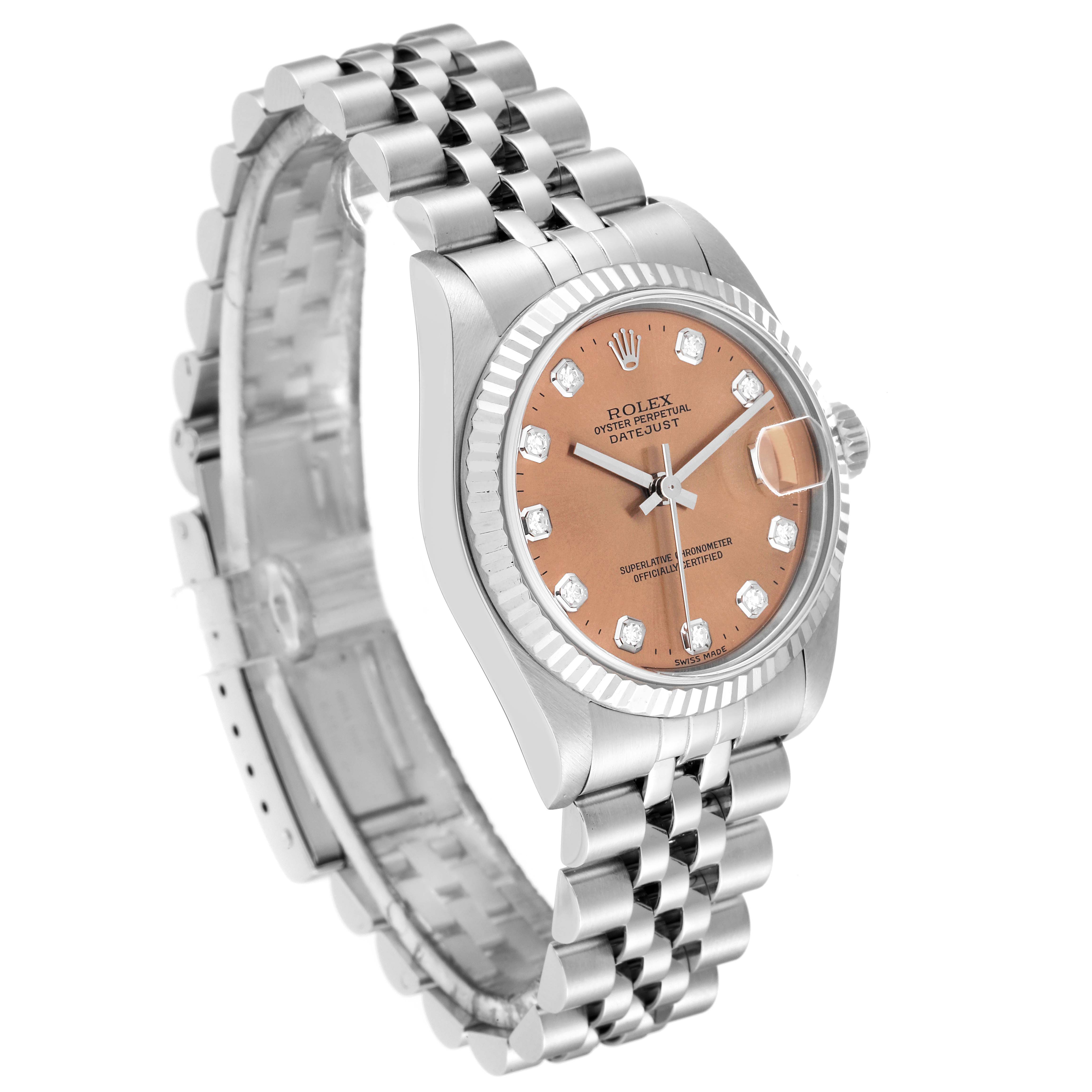 This image features a Rolex Mid-Size 68274 Women's Stainless Steel Pink Dial 68274 Women's Stainless Steel Pink Dial Datejust watch, showing the face, bezel, and bracelet at a three-quarter angle.