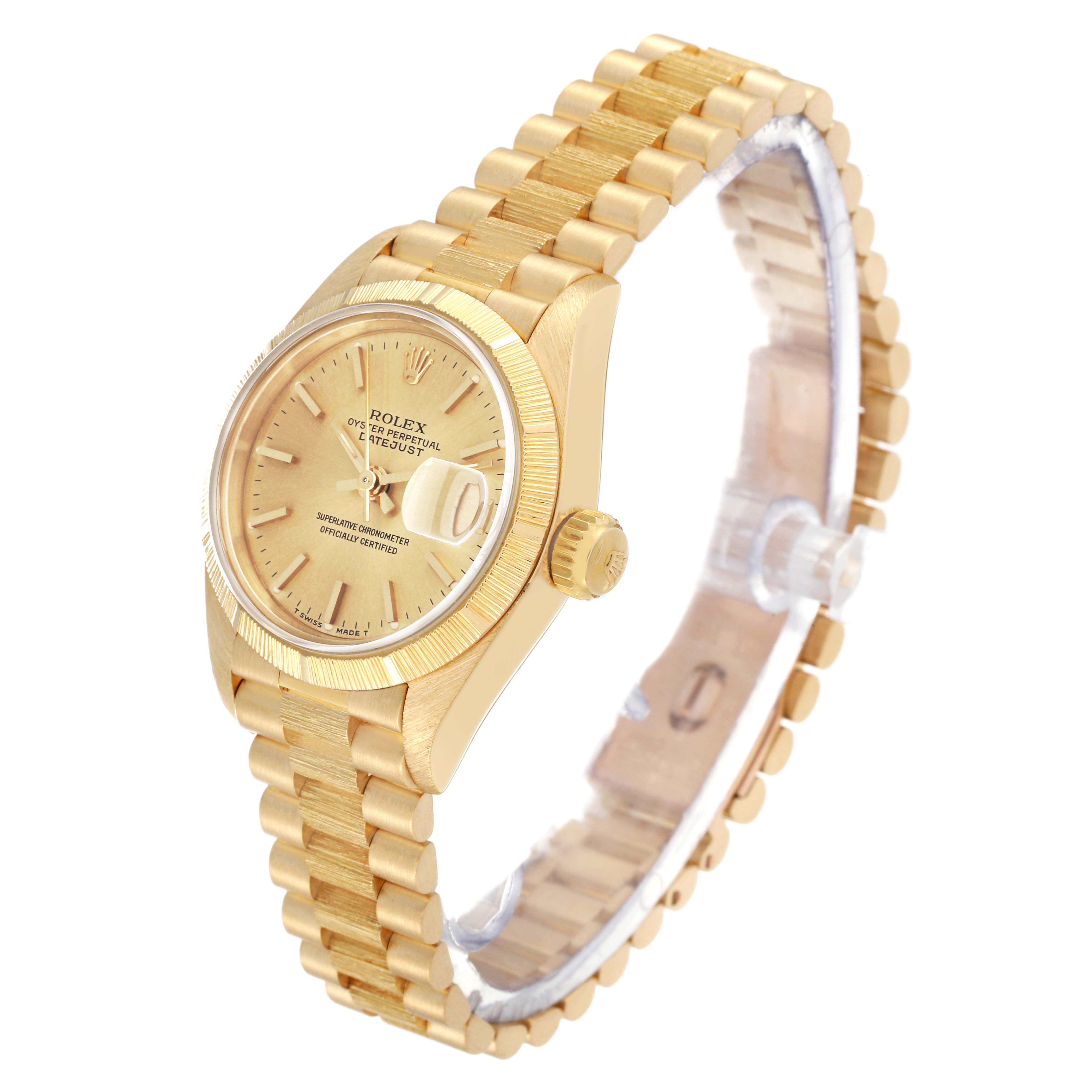 This image shows a Rolex President 69278 Women
s Yellow Gold Champagne Dial 69278 Women
s Yellow Gold Champagne Dial model watch angled to display its face, bezel, crown, and gold bracelet band.