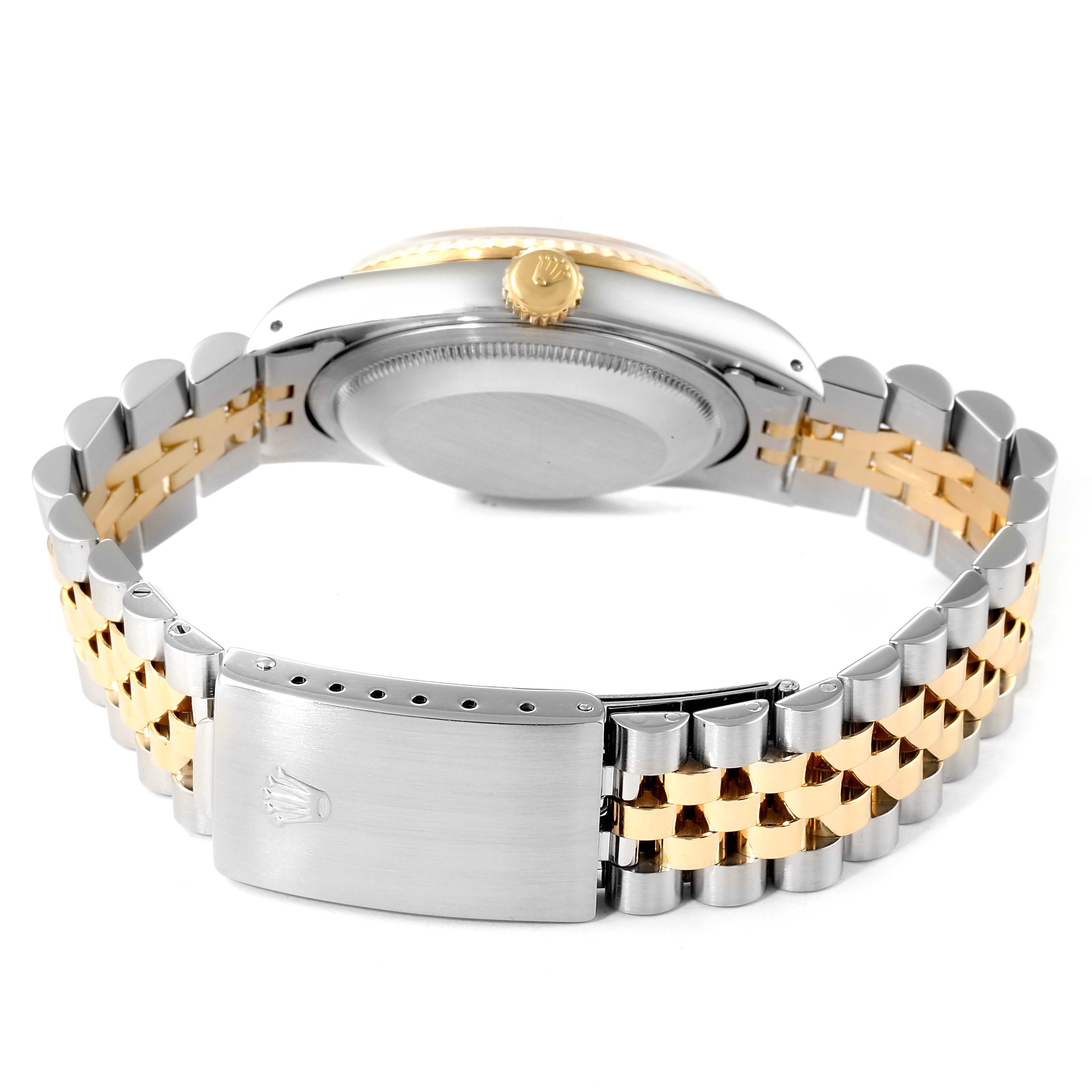 This image shows the back of a Rolex Datejust 16233 Men's Steel and Gold (two tone) Champagne Dial 16233 Men's Steel and Gold (two tone) Champagne Dial watch, focusing on the clasp and bracelet.