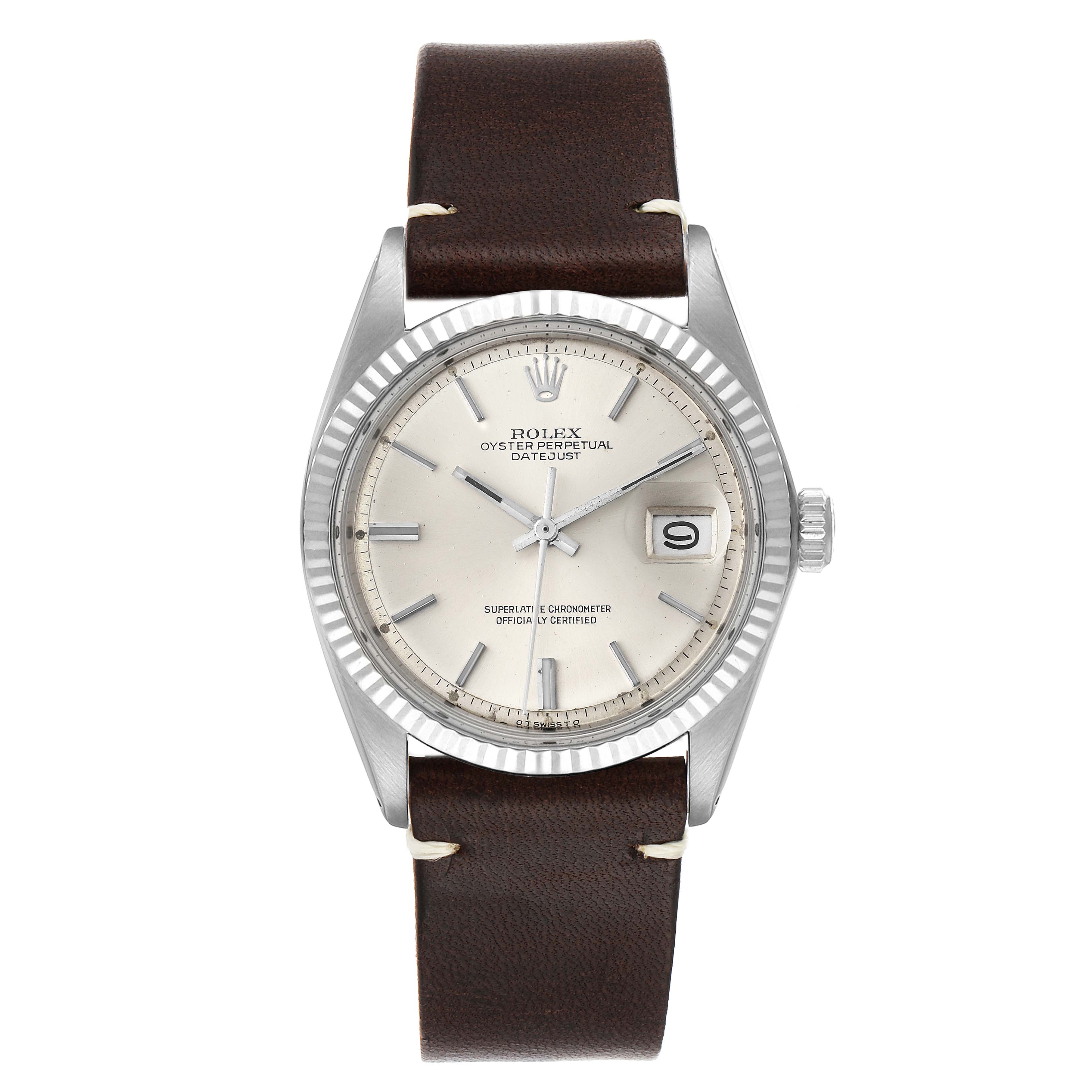 This Rolex Vintage Collection 1601 Men's Stainless Steel Silver Dial 1601 Men's Stainless Steel Silver Dial Oyster Perpetual Datejust watch is shown from the front, highlighting its dial, bezel, case, and leather strap.
