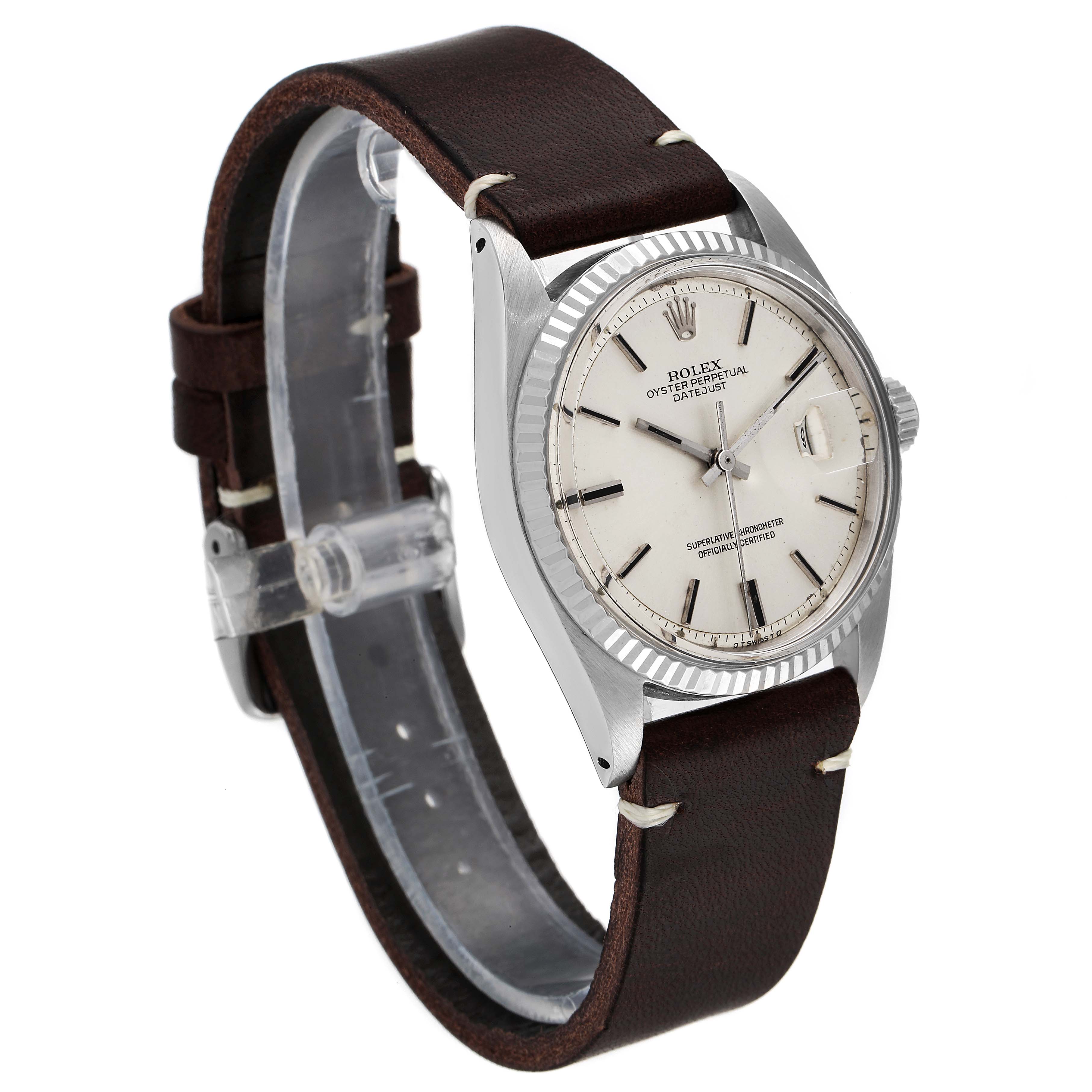 This image shows a Rolex Vintage Collection 1601 Men's Stainless Steel Silver Dial 1601 Men's Stainless Steel Silver Dial model, featuring a silver dial, fluted bezel, and brown leather strap, angled at three-quarters view.